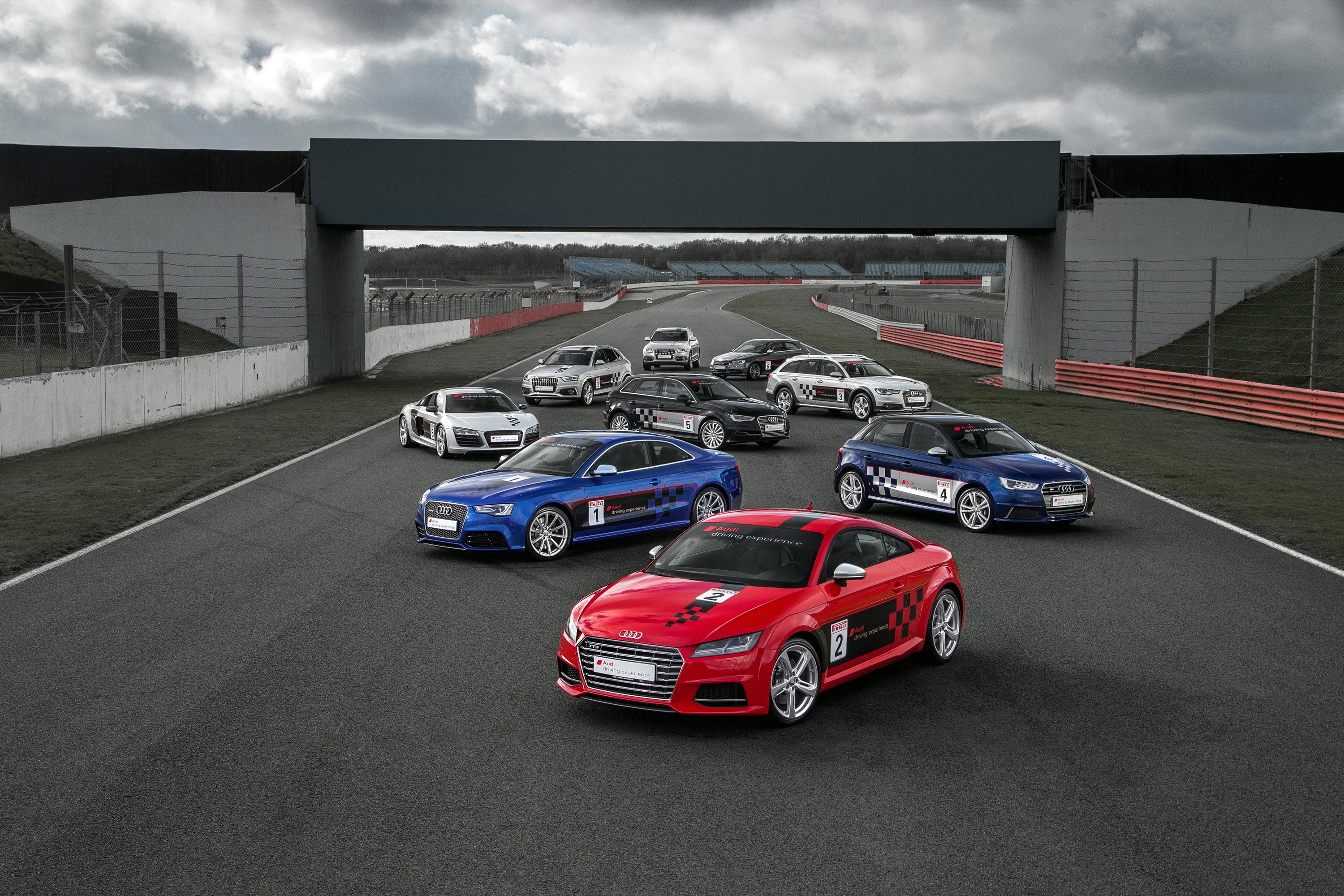 Audi RS cars on a race track HD Wallpaper