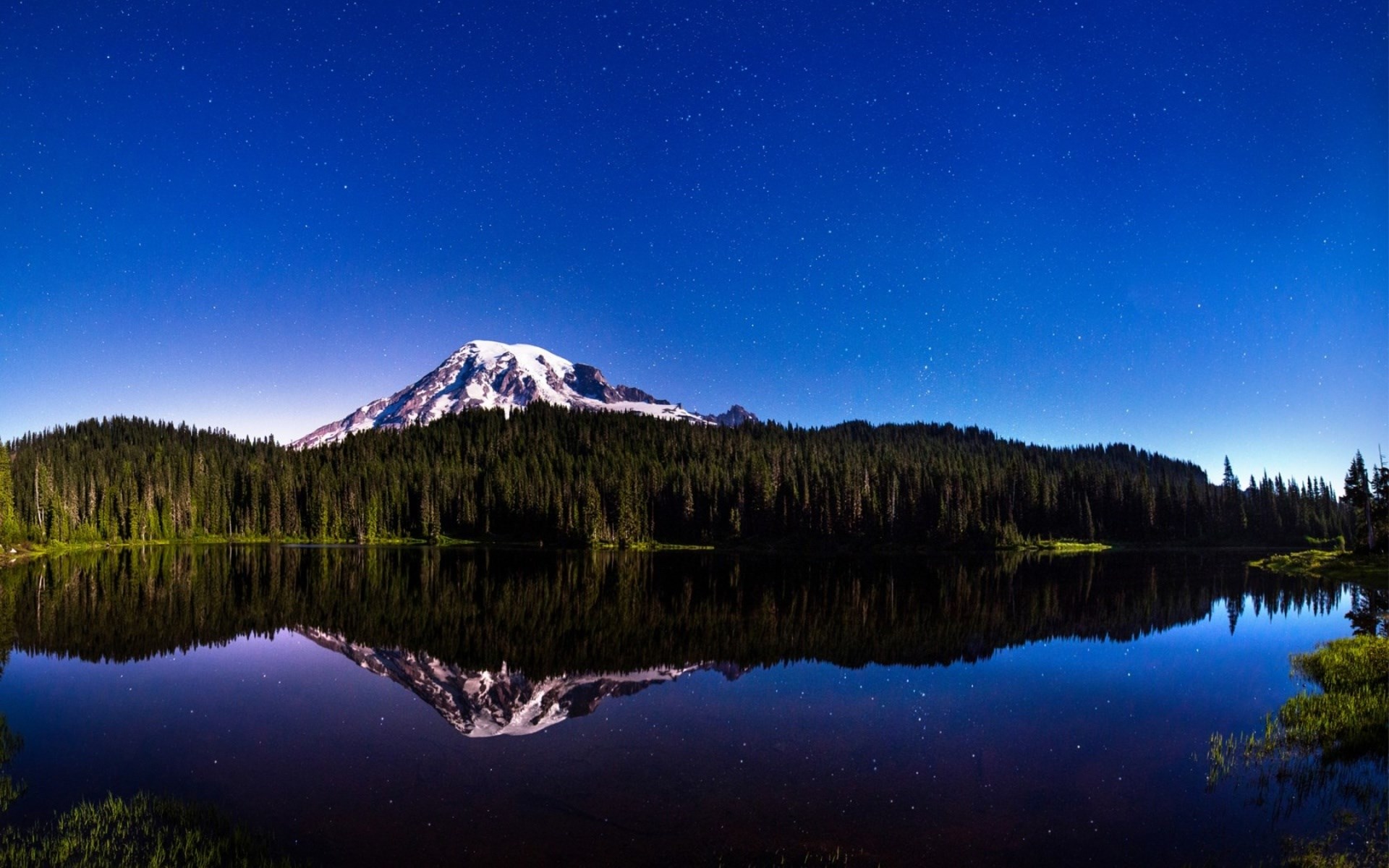 Mount Rainier reflected in a lake at night HD Wallpaper