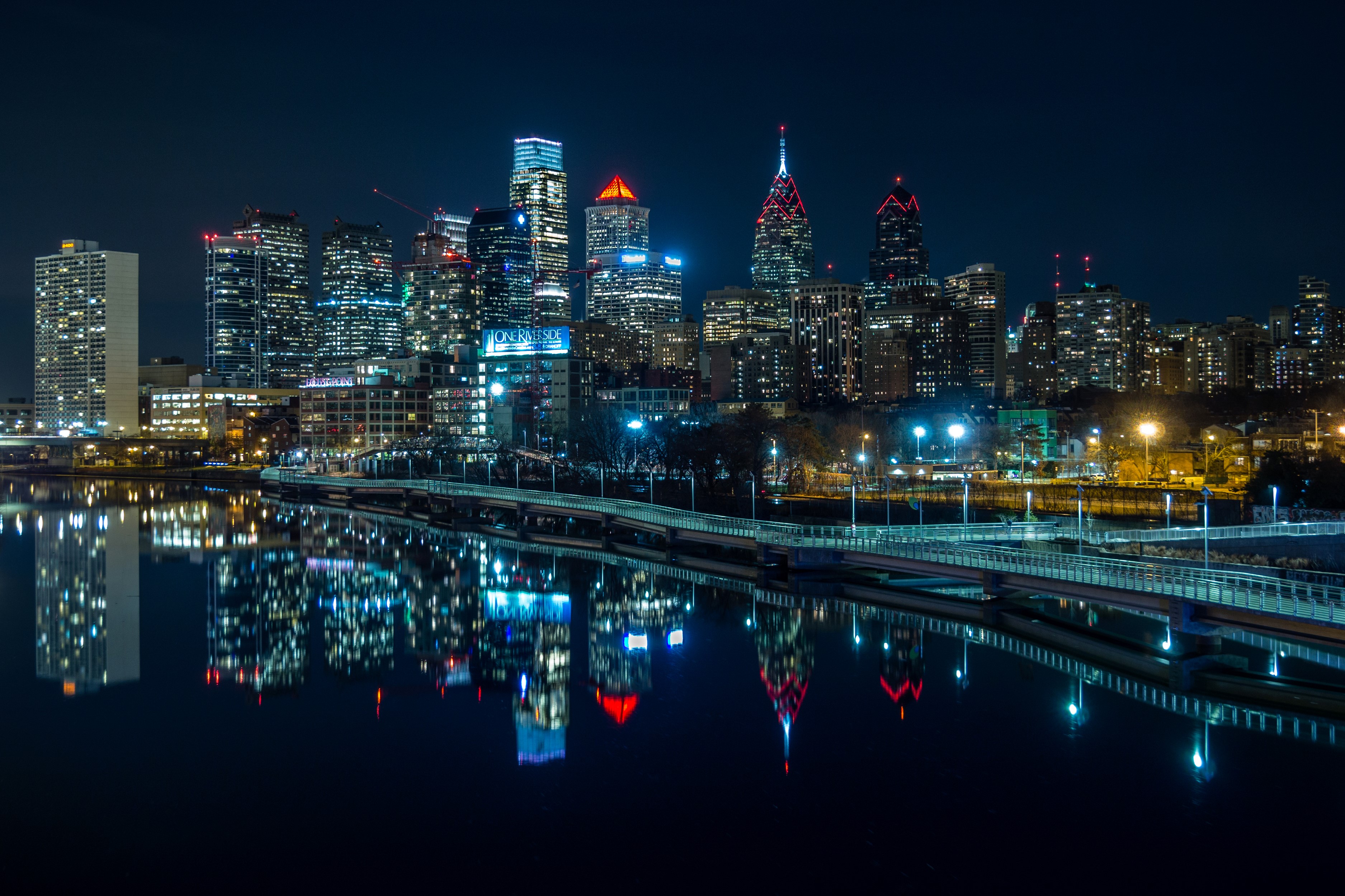 Philadelphia skyline reflected in river at night HD Wallpaper