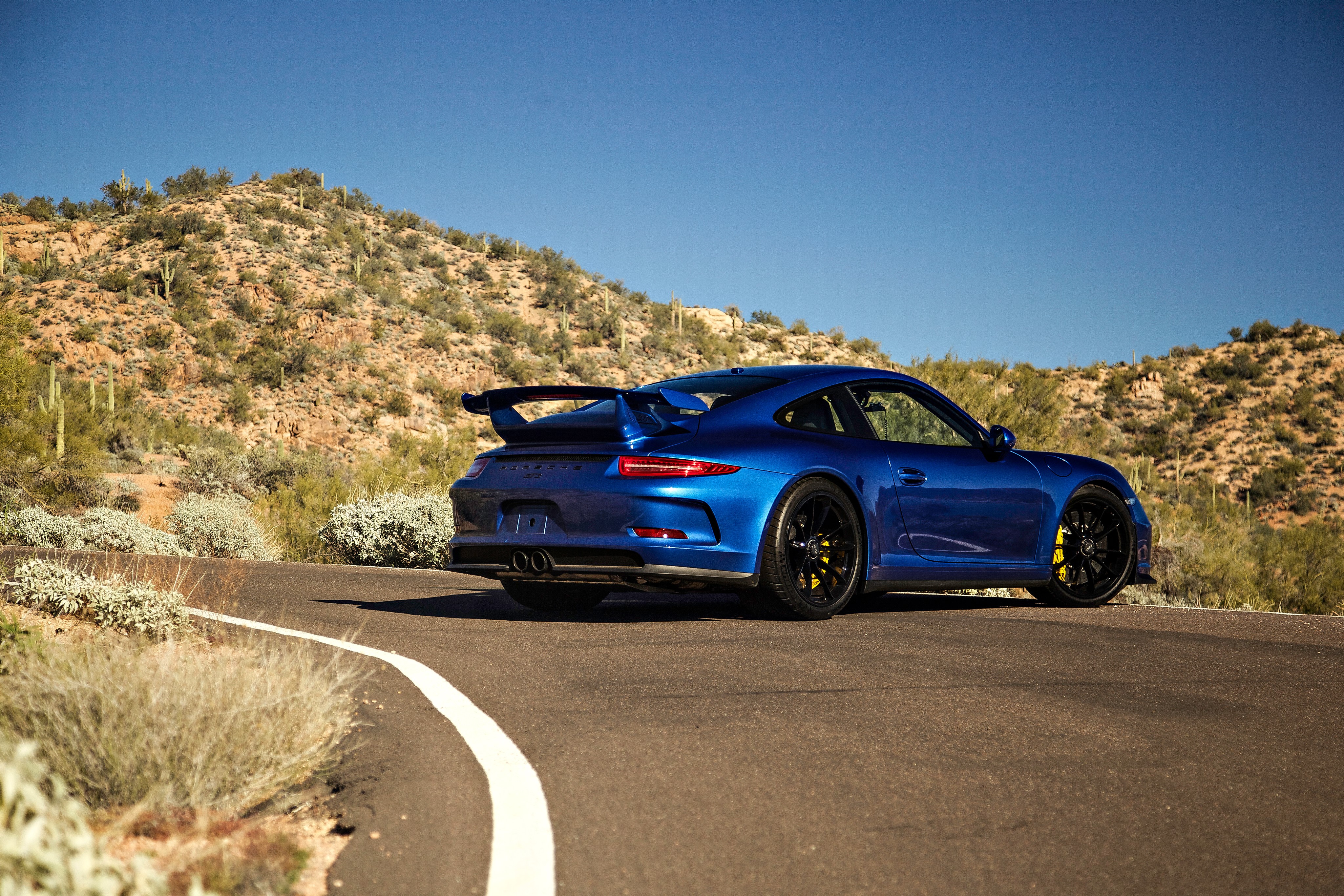 Blue Porsche 911 GT3 on a desert road HD Wallpaper