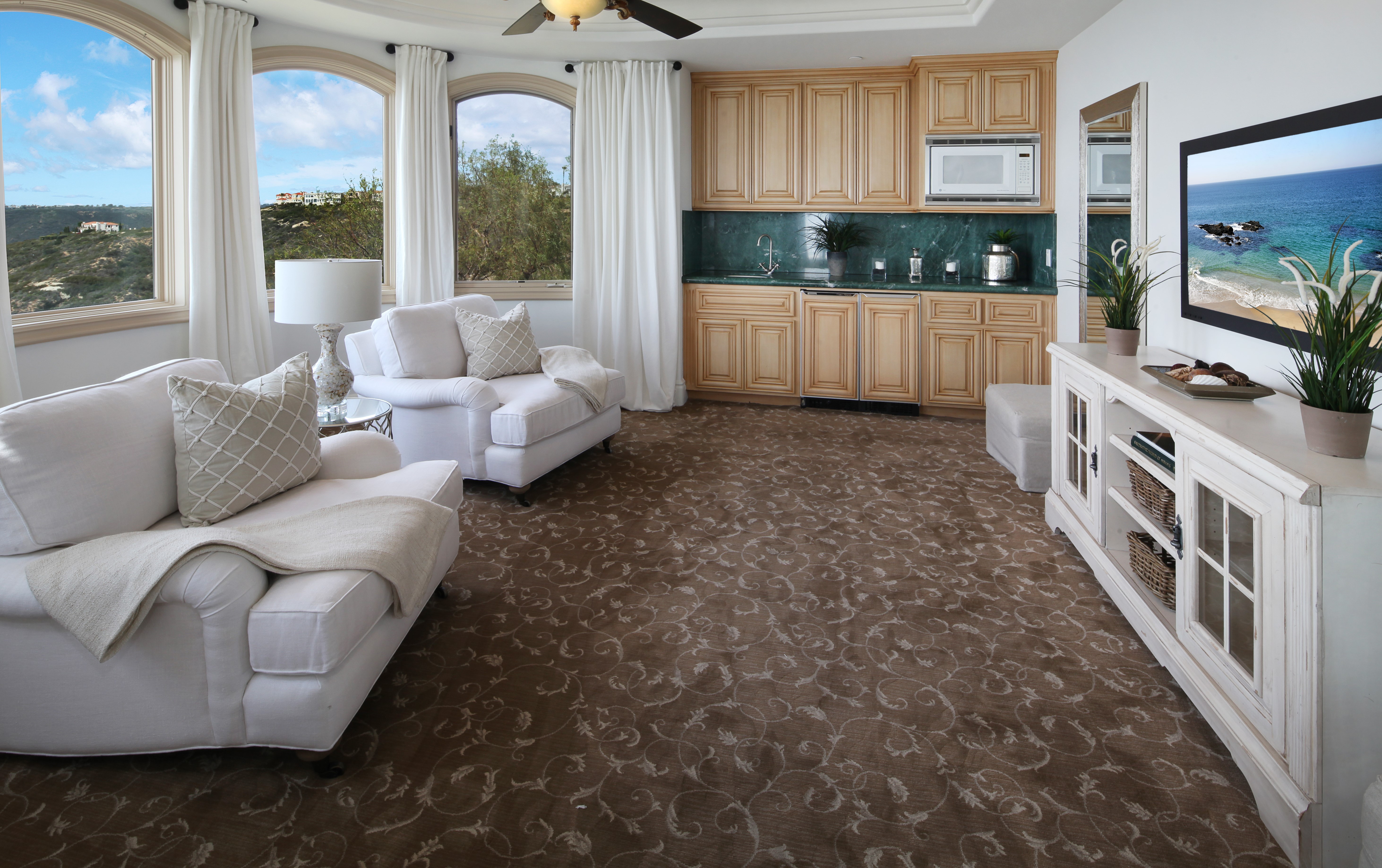 Living room with armchairs and a wet bar HD Wallpaper