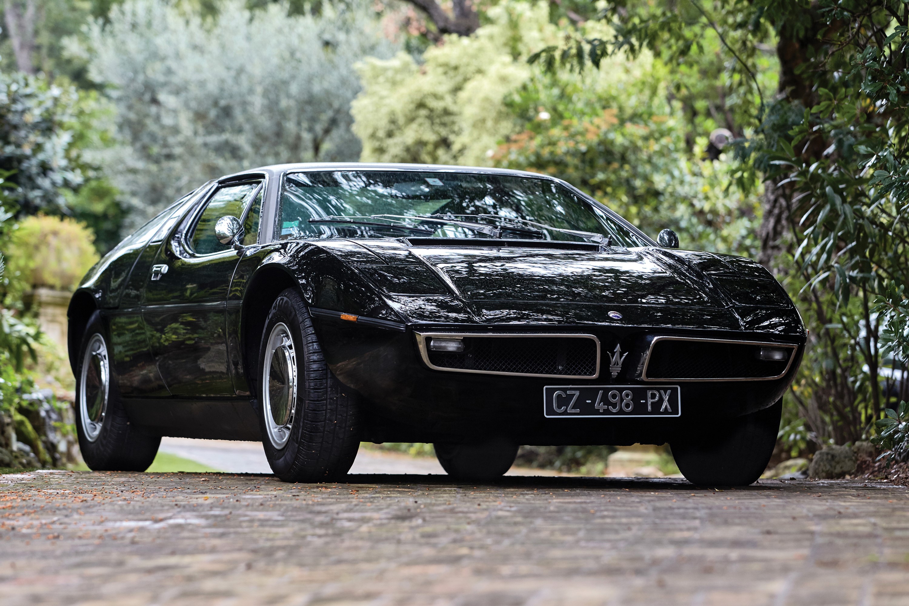 Black Maserati Bora AM117 parked outdoors HD Wallpaper