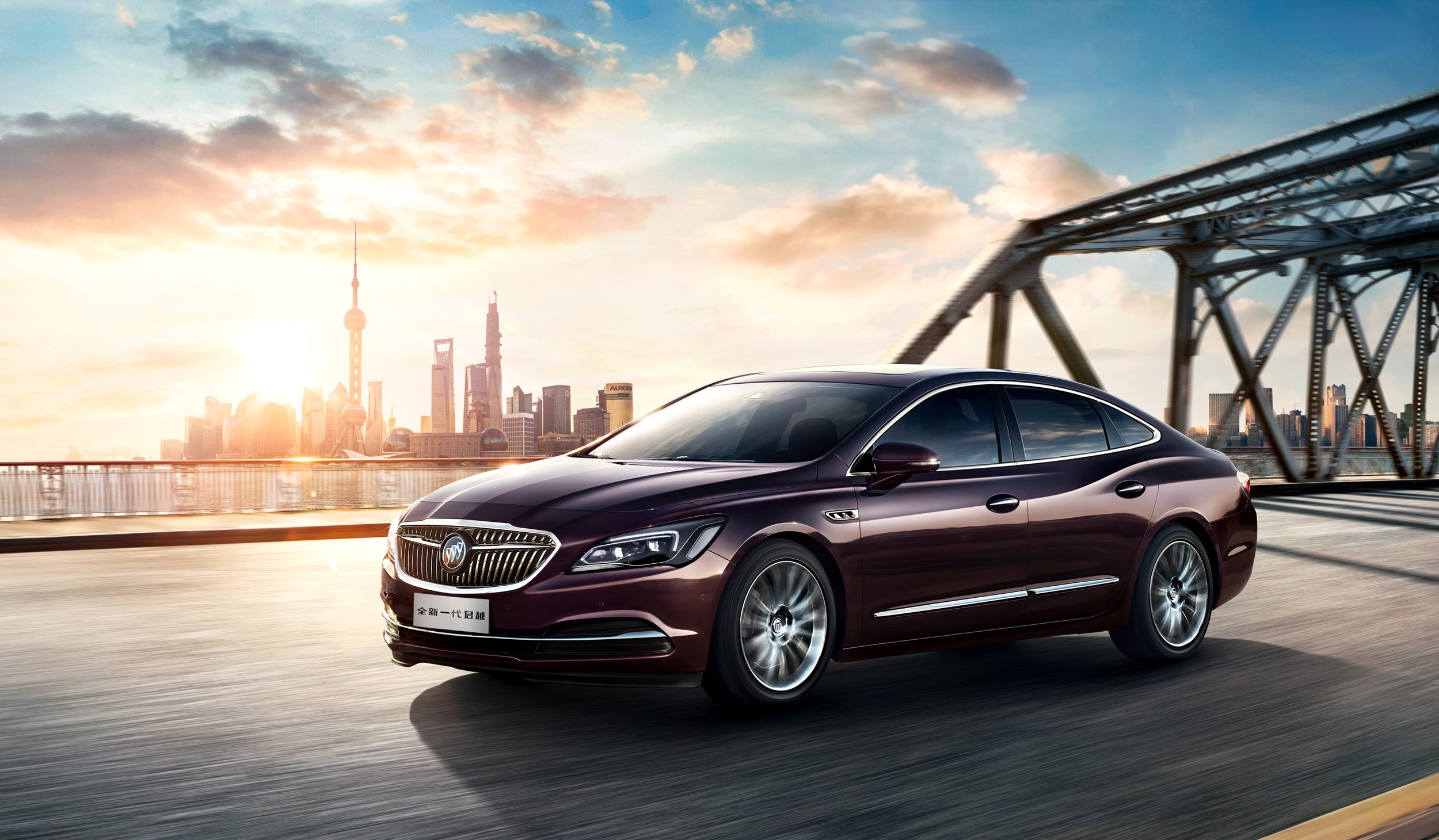 Buick LaCrosse driving on a bridge in Shanghai HD Wallpaper