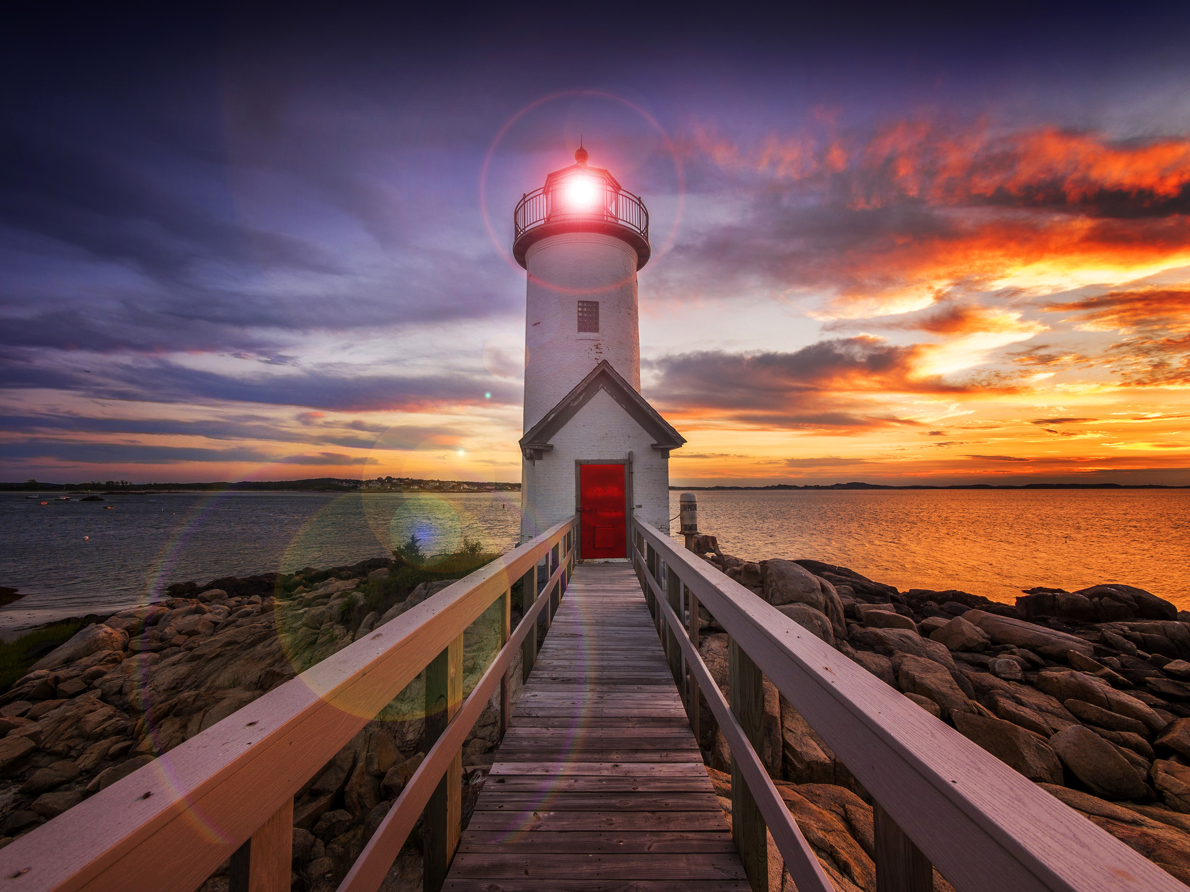 Lighthouse at Sunset with Wooden Walkway HD Wallpaper