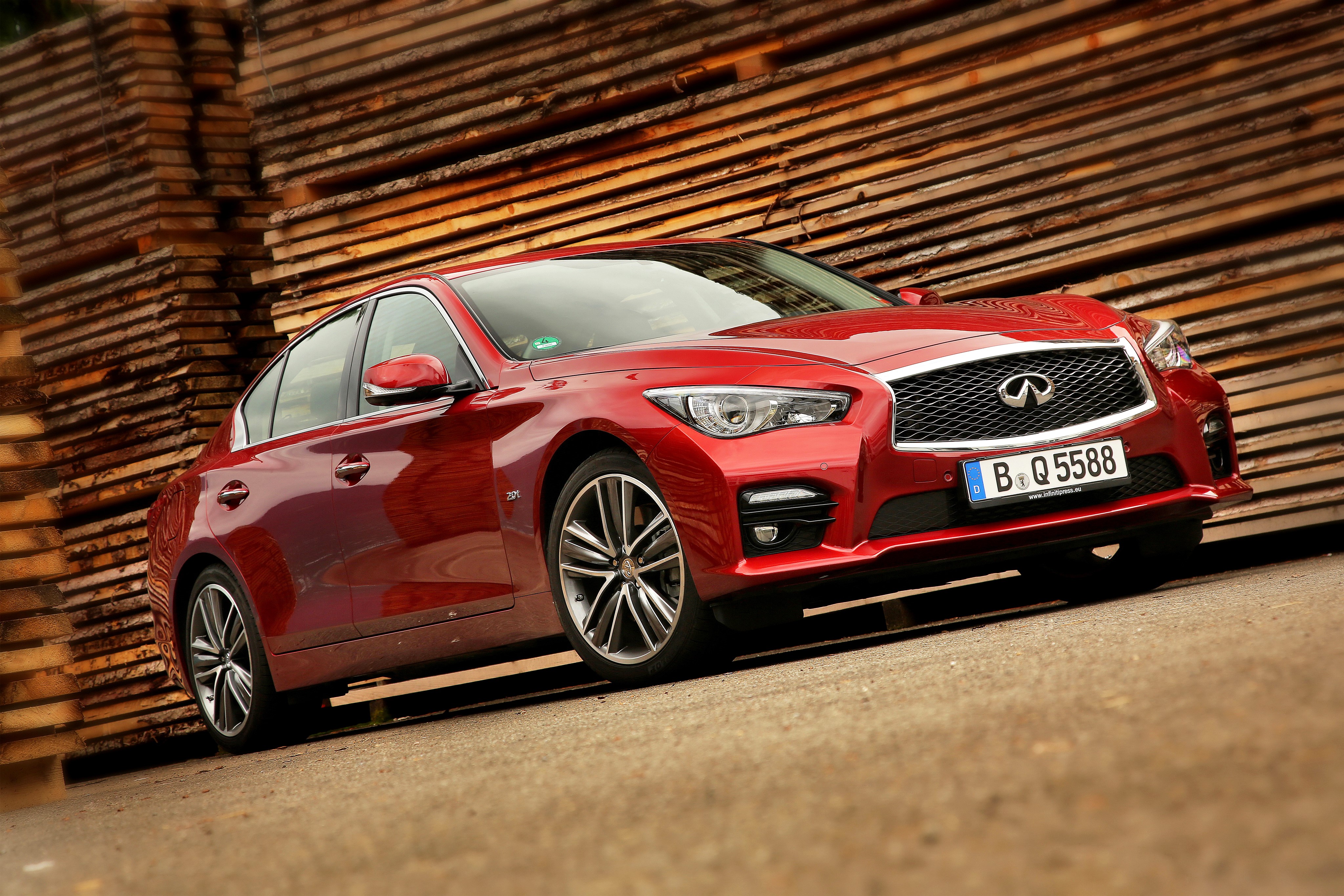 Red Infiniti Q50 Sedan HD Wallpaper