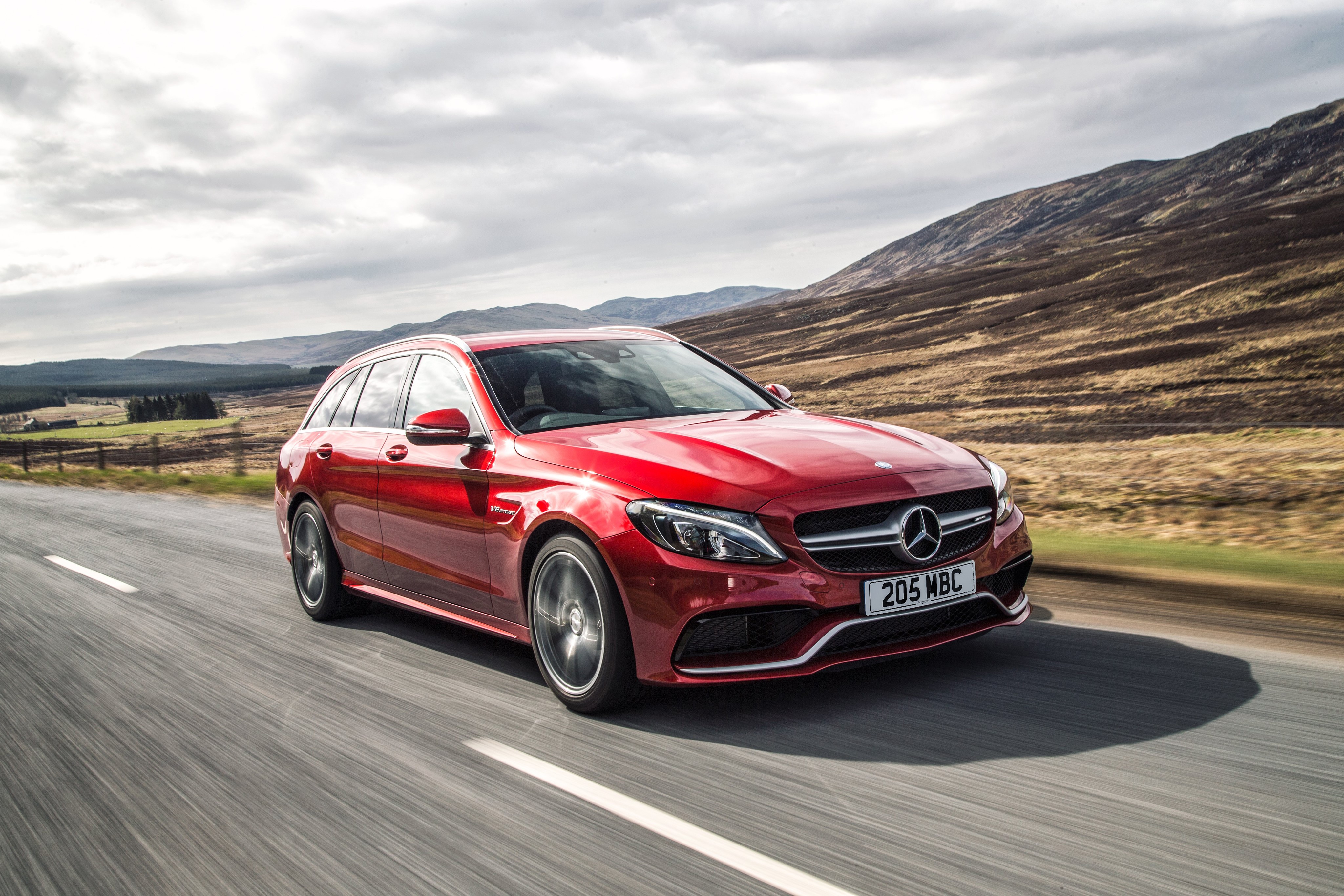 Mercedes-Benz AMG C 63 Estate S205 driving on a road HD Wallpaper