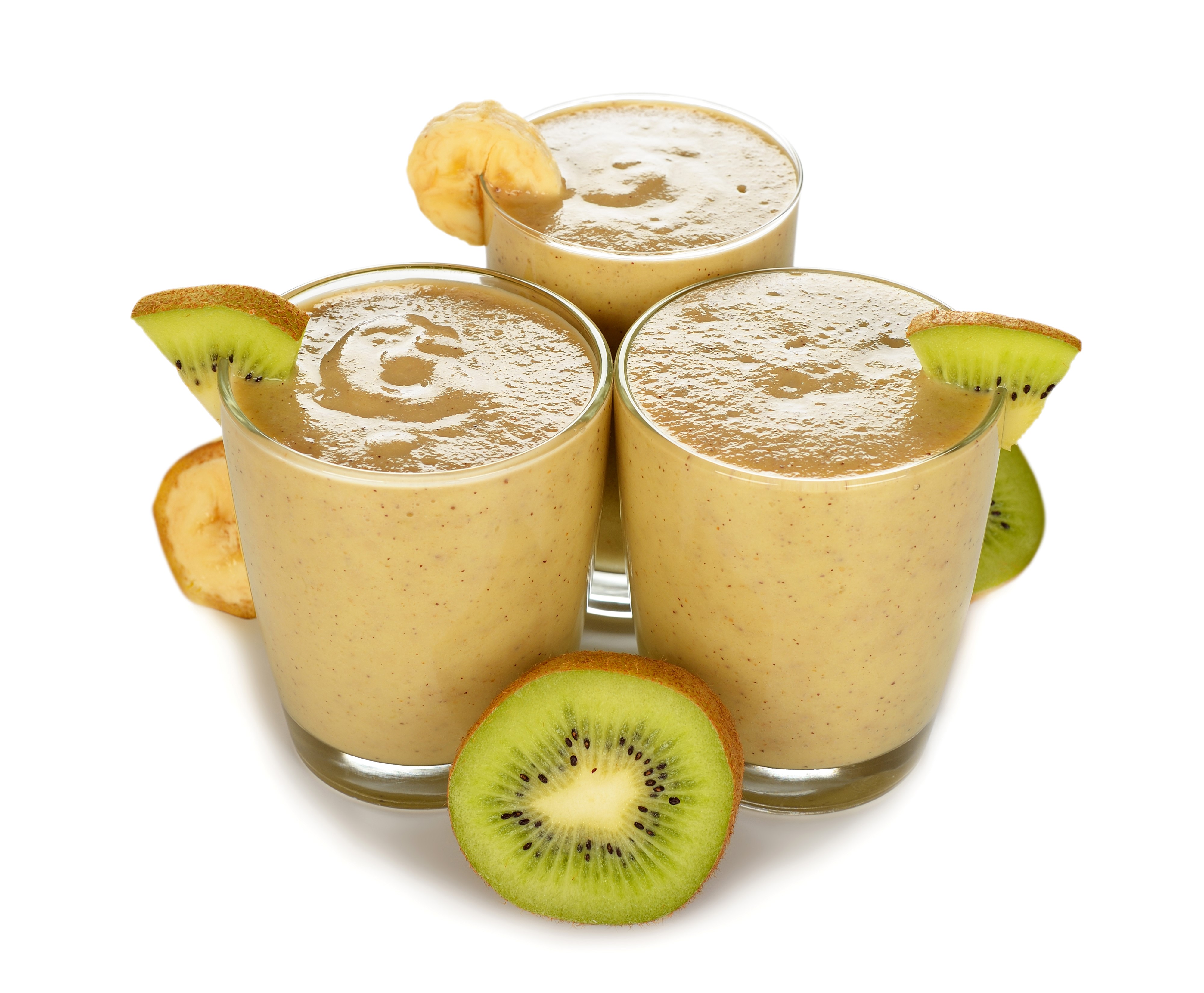 Three glasses of kiwi banana smoothie with fruit garnish HD Wallpaper