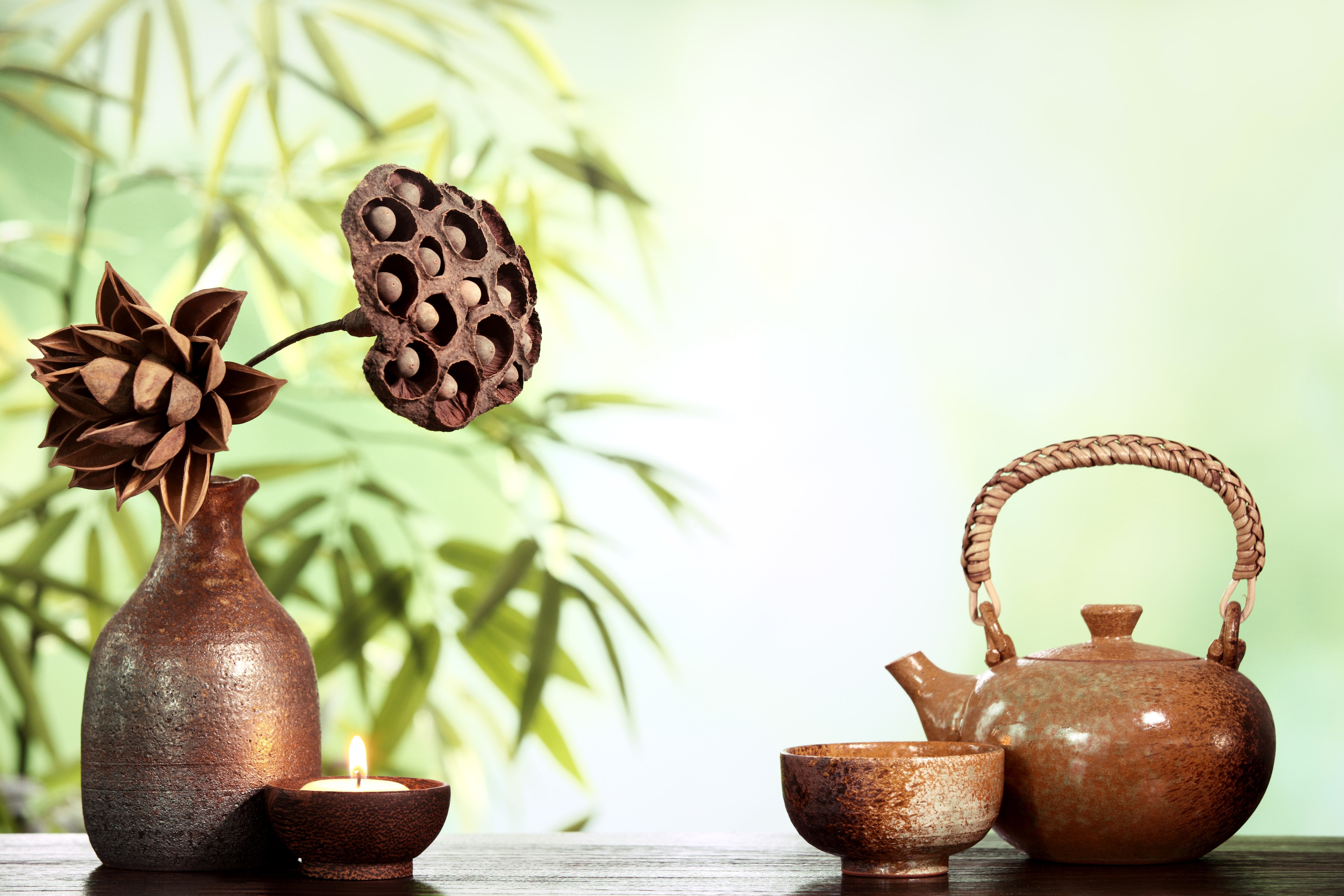 Tea set with dried flowers and candle HD Wallpaper