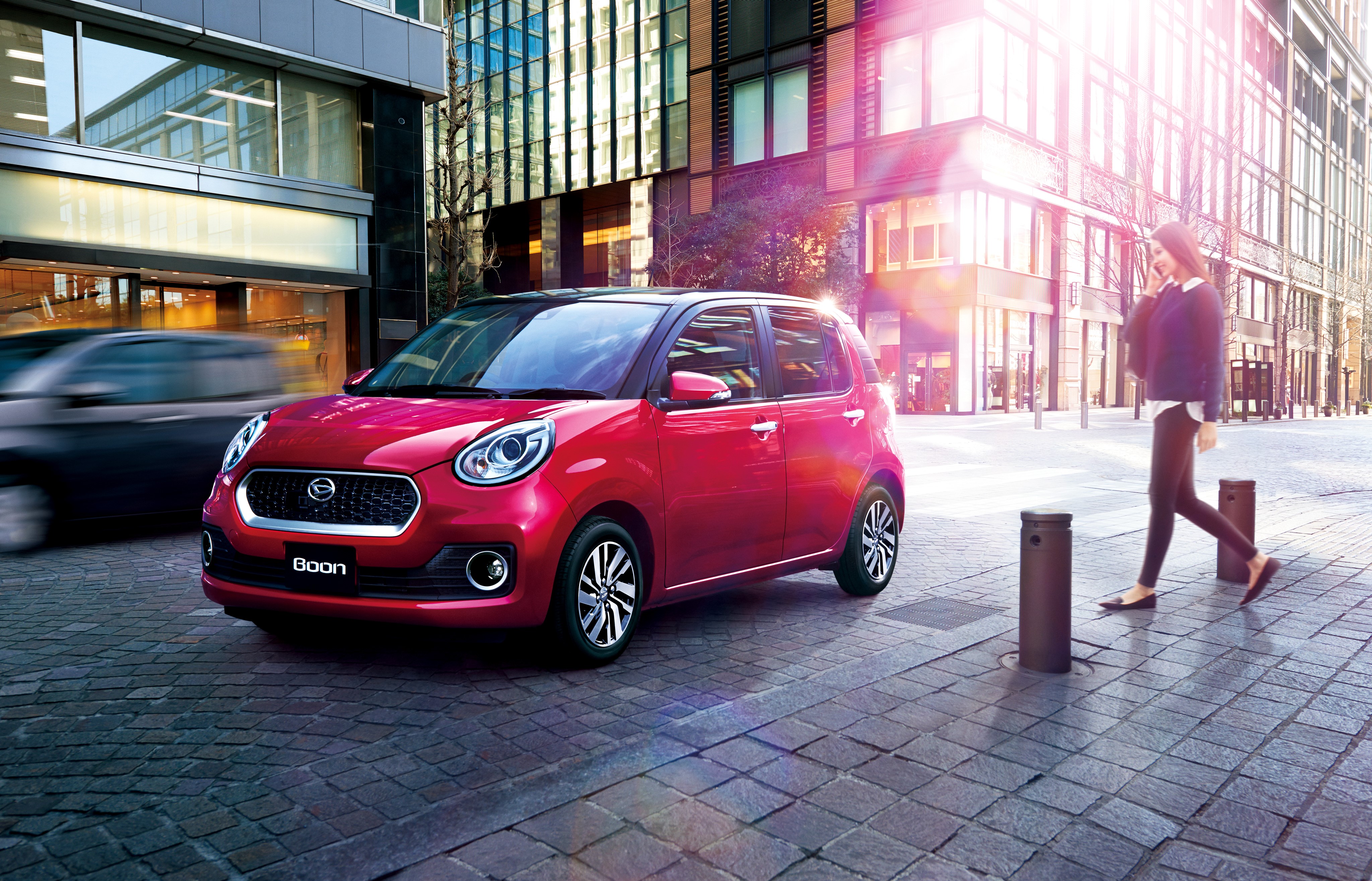 Red 2016 Daihatsu Boon CiLQ on a City Street HD Wallpaper