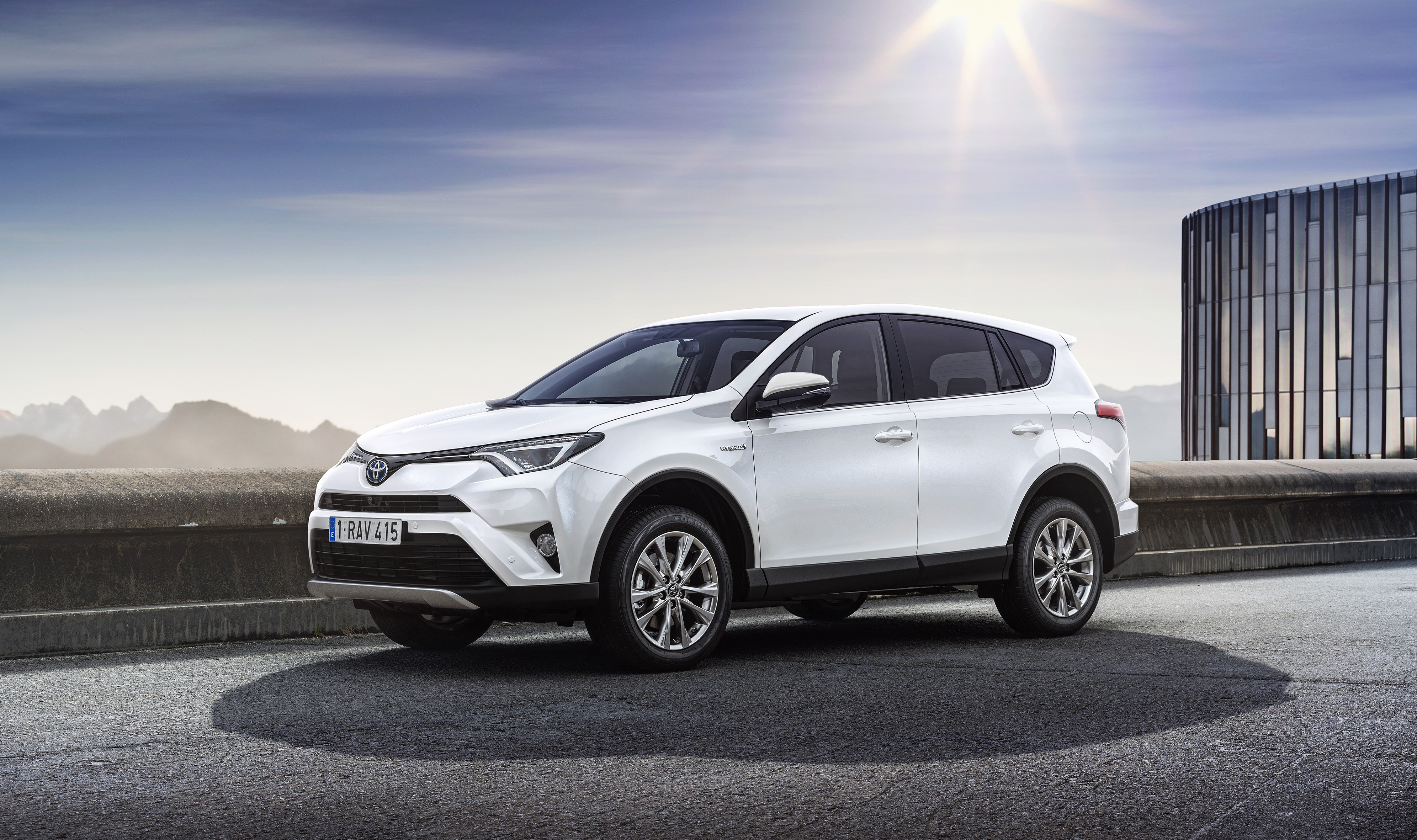 White 2015 Toyota RAV4 Hybrid HD Wallpaper