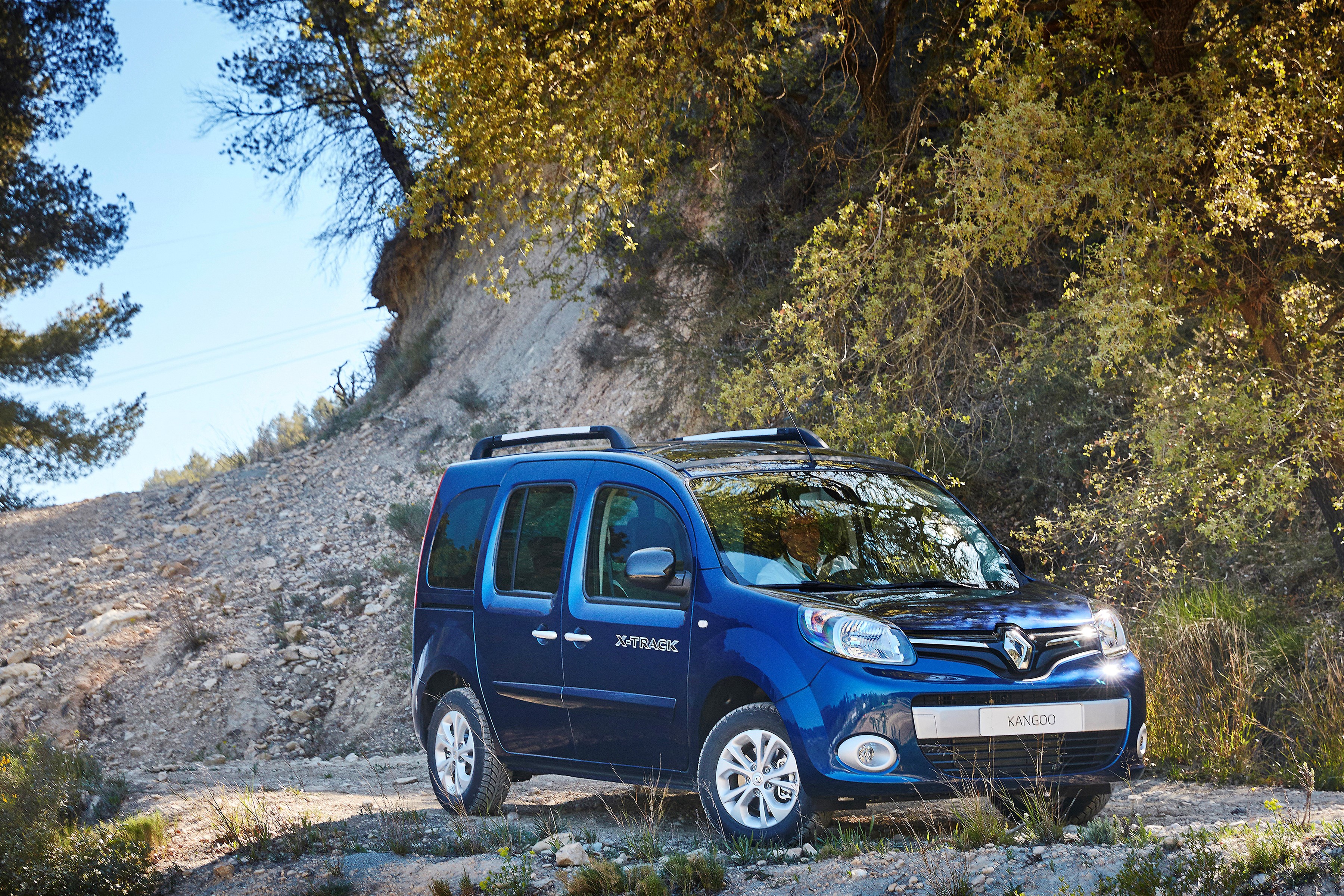 Blue Renault Kangoo X-Track on a dirt road HD Wallpaper