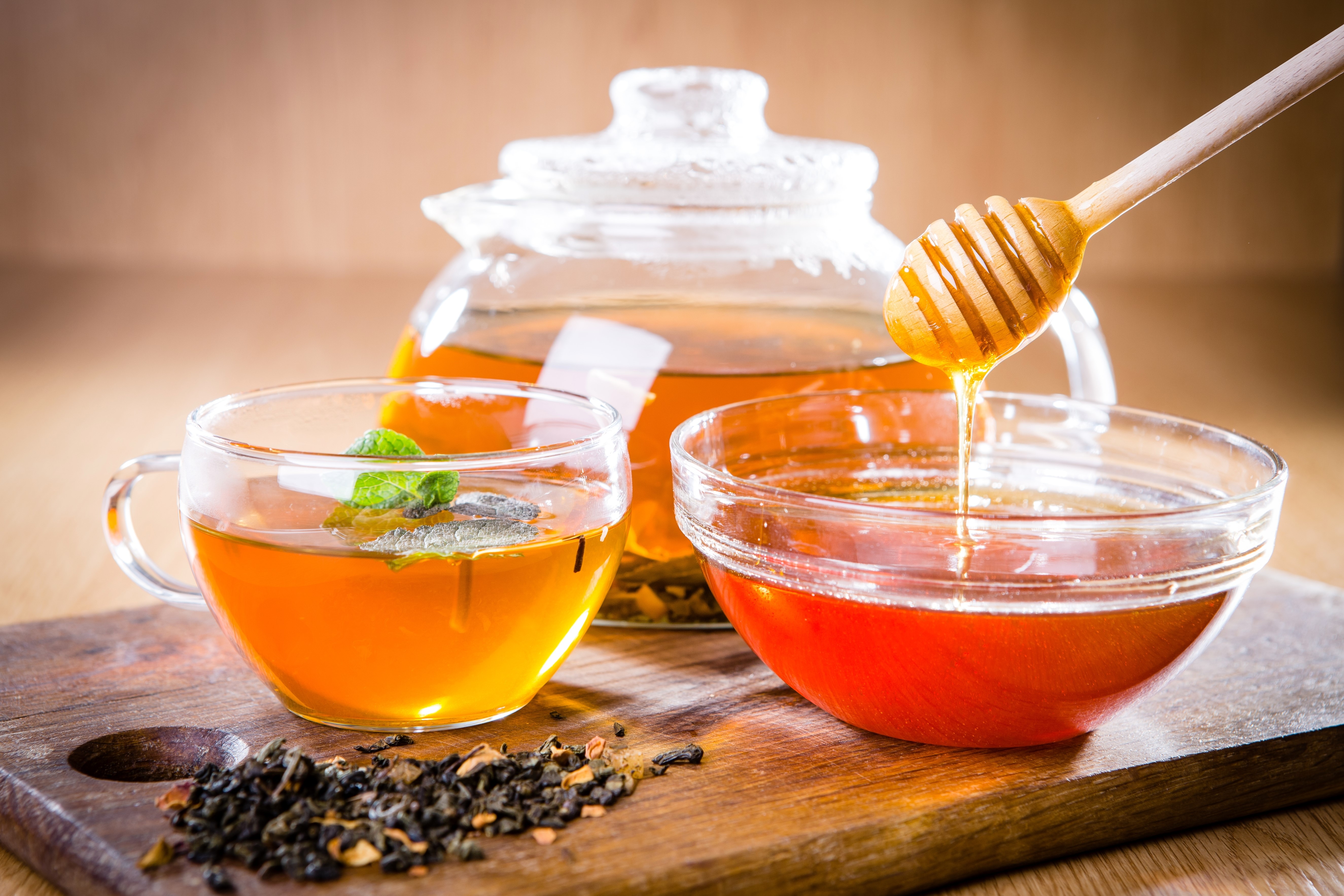 Tea, Honey, and Tea Leaves on a Wooden Board HD Wallpaper