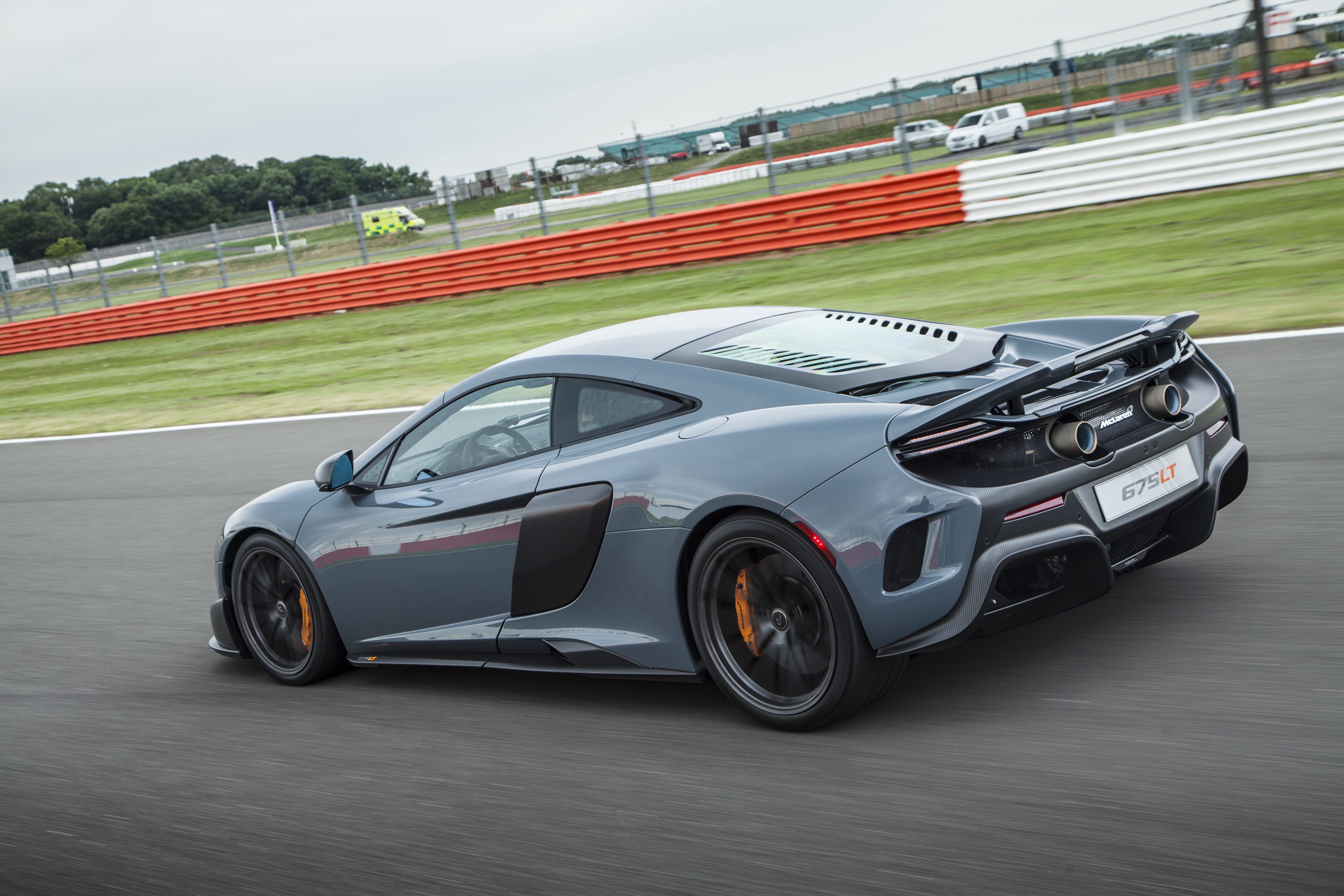 McLaren 675LT on a Race Track HD Wallpaper