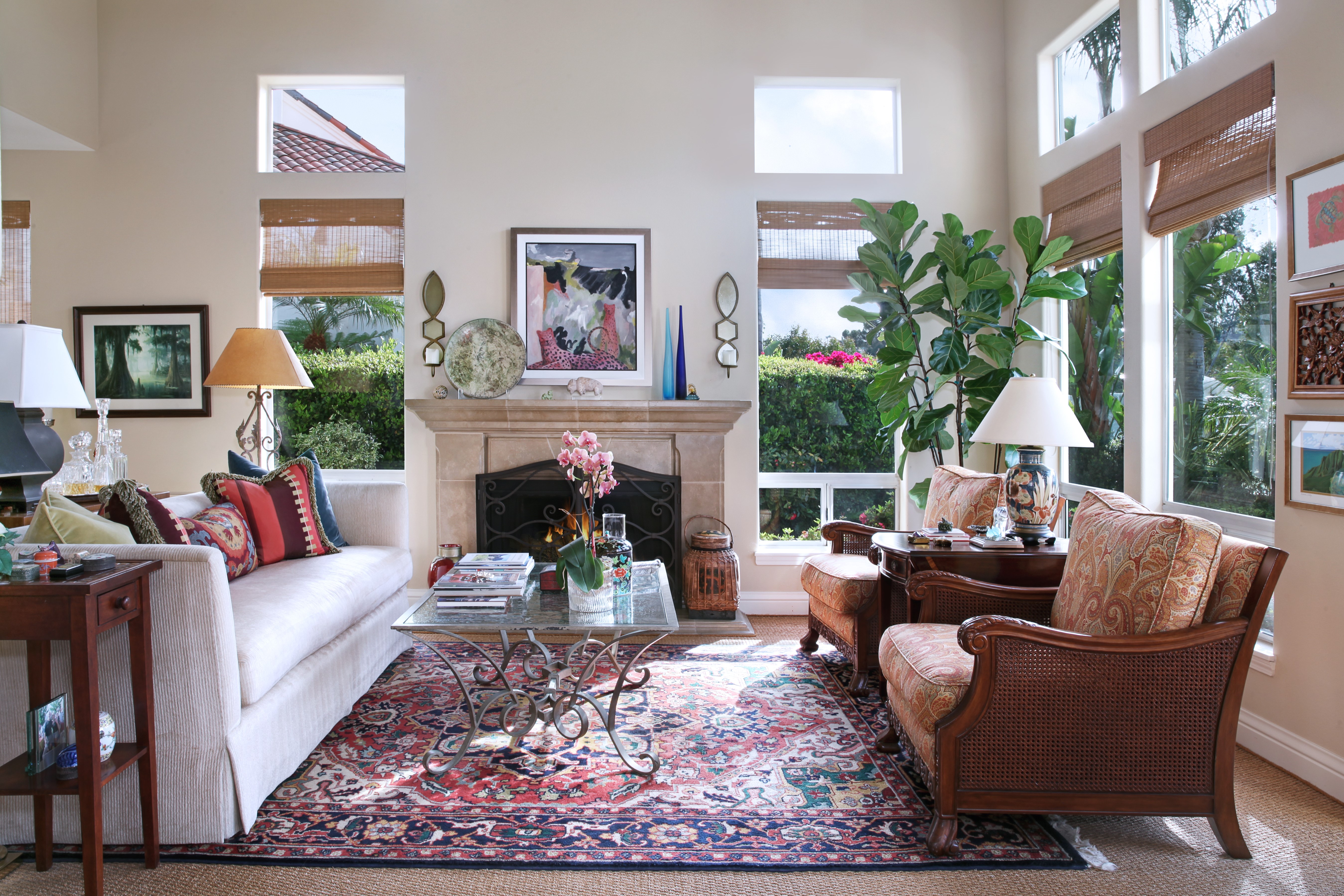 Living room with sofa, armchair, and fireplace HD Wallpaper
