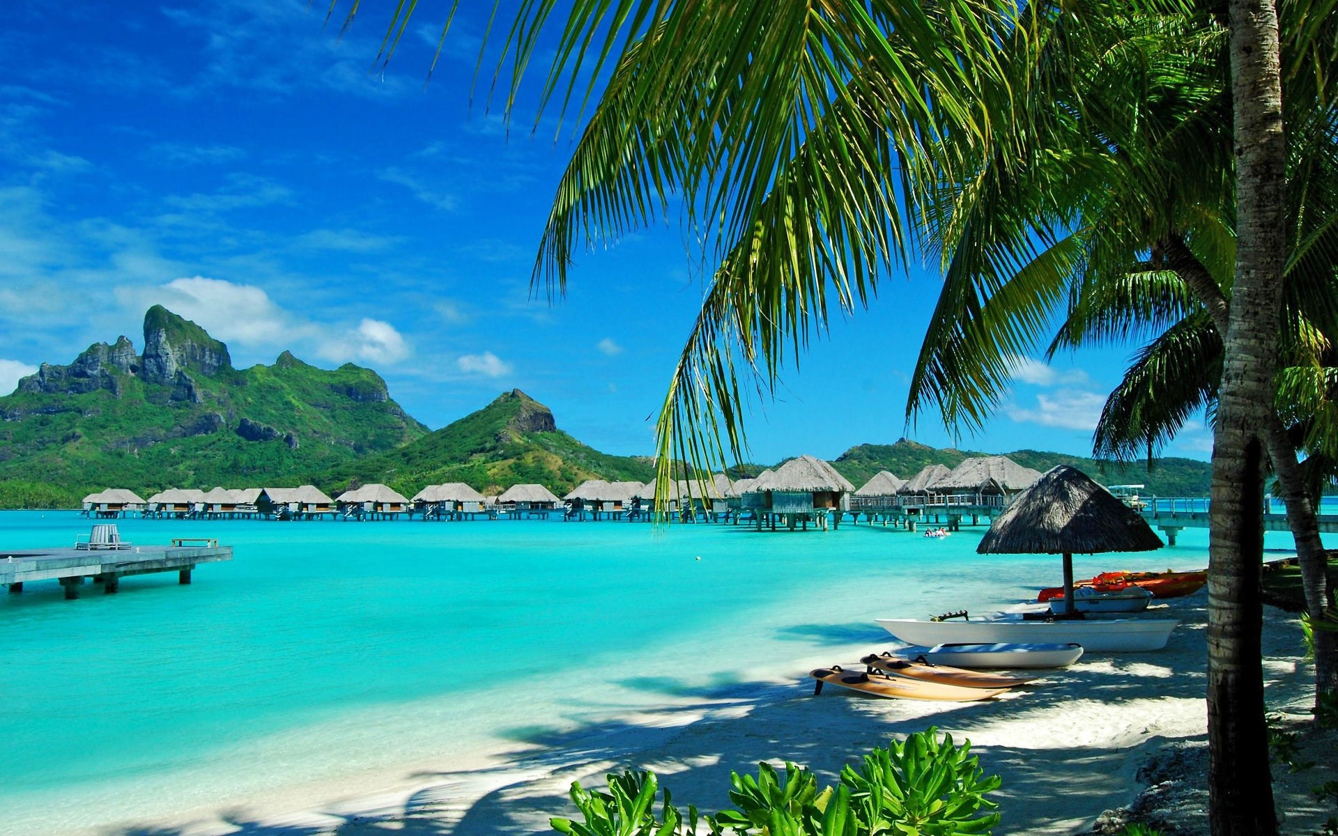 Overwater bungalows in Bora Bora with Mount Otemanu HD Wallpaper