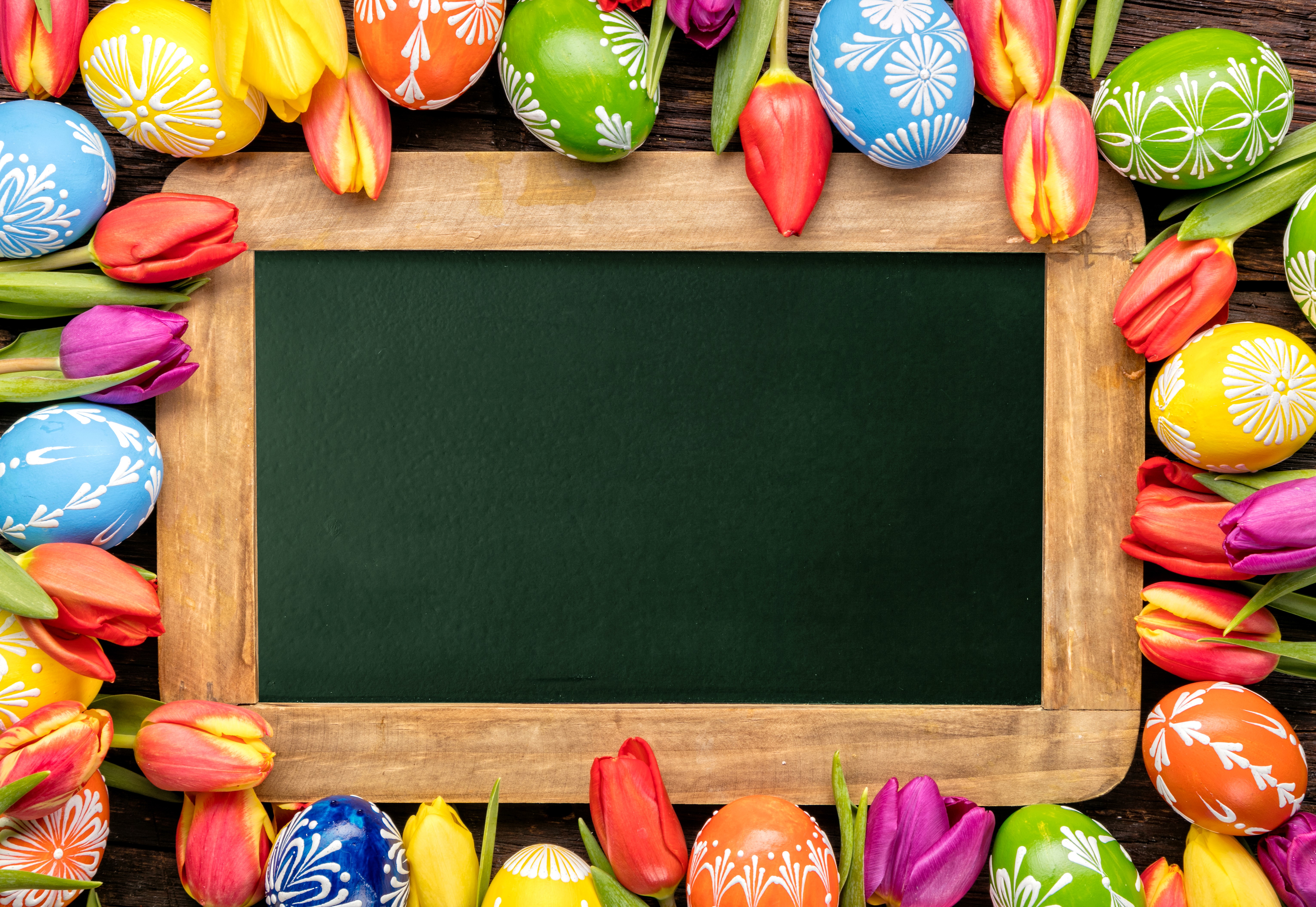 Easter Eggs and Tulips Bordering a Chalkboard HD Wallpaper