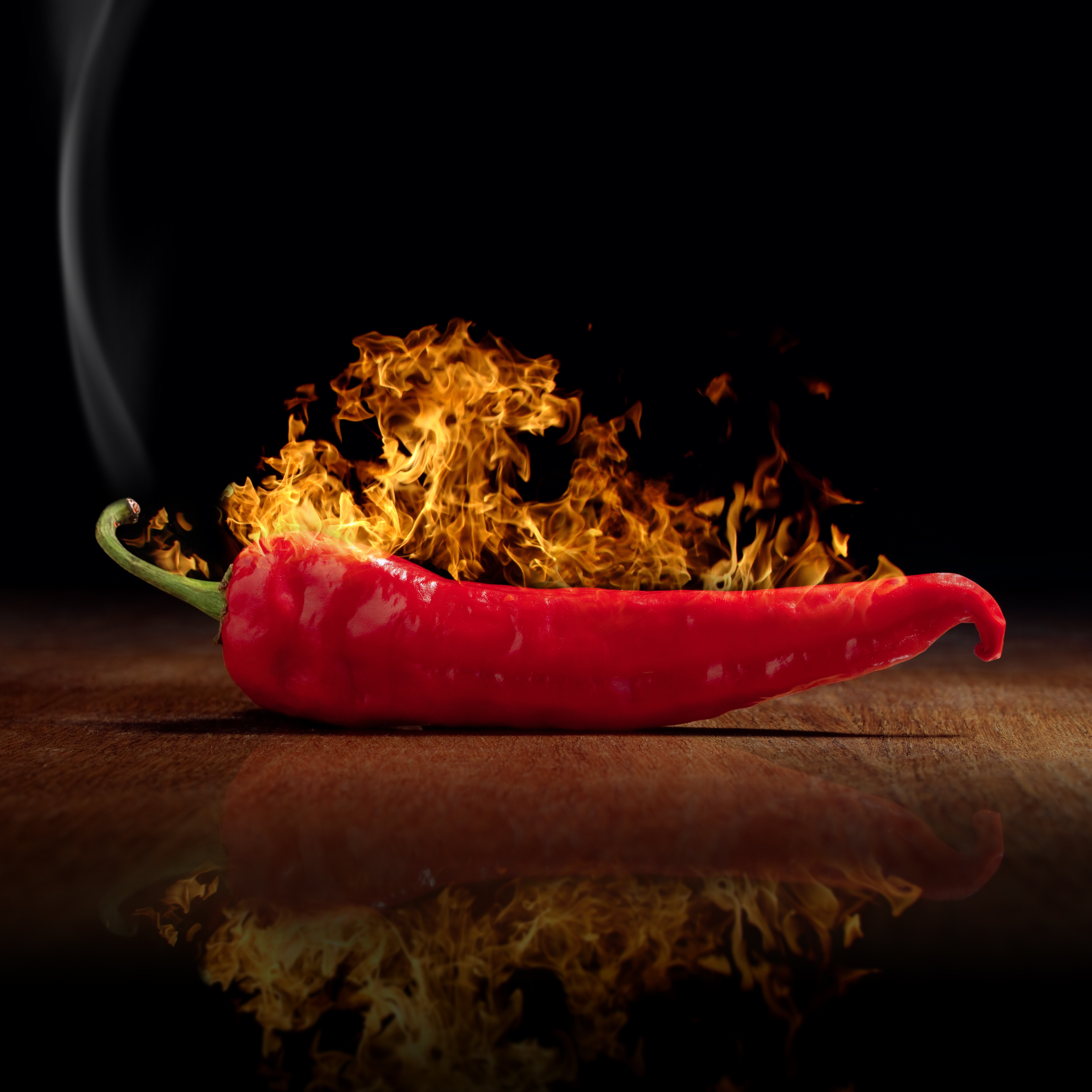 Red chili pepper on fire HD Wallpaper