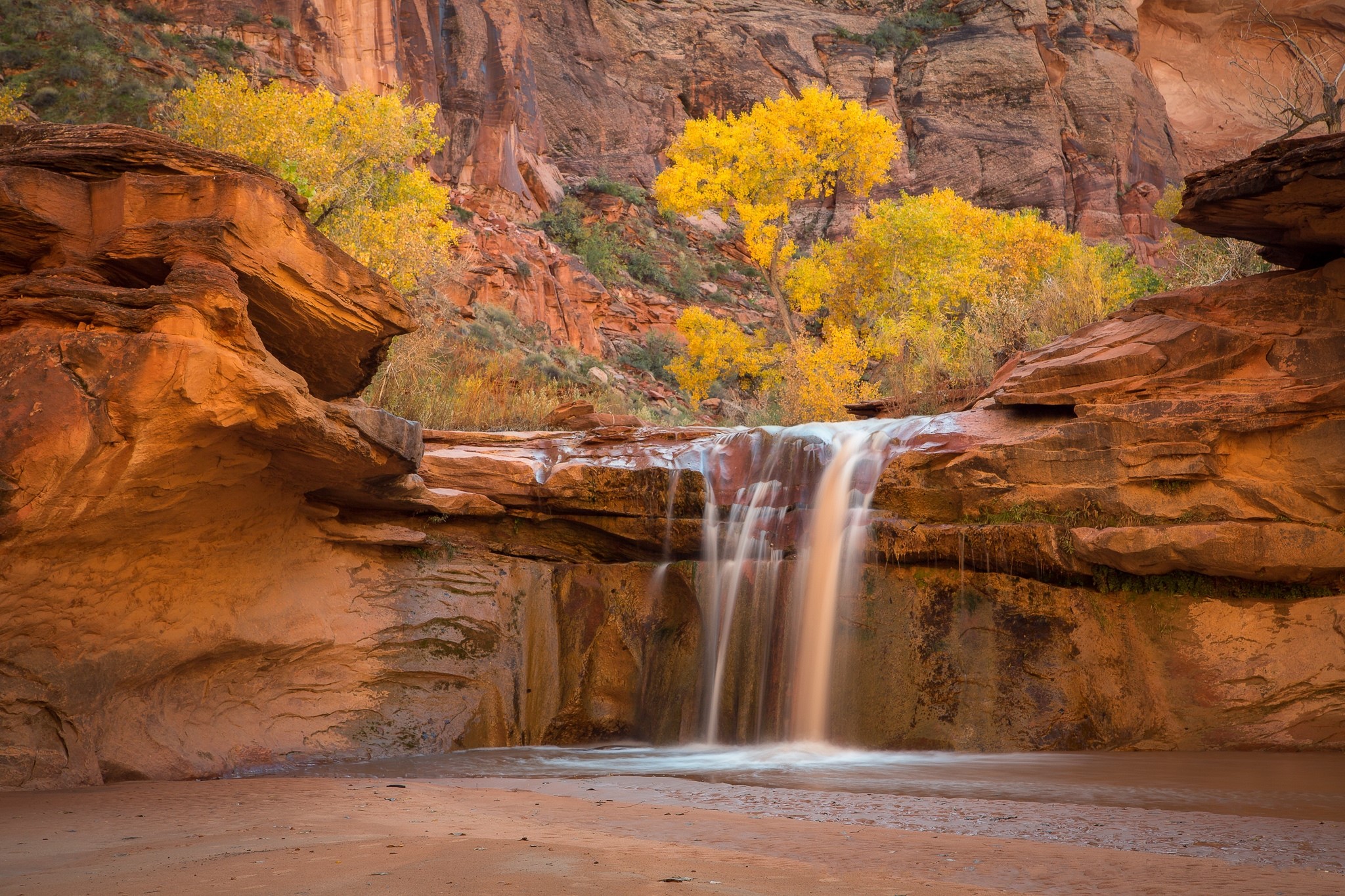 Autumn waterfall in a sandstone canyon HD Wallpaper