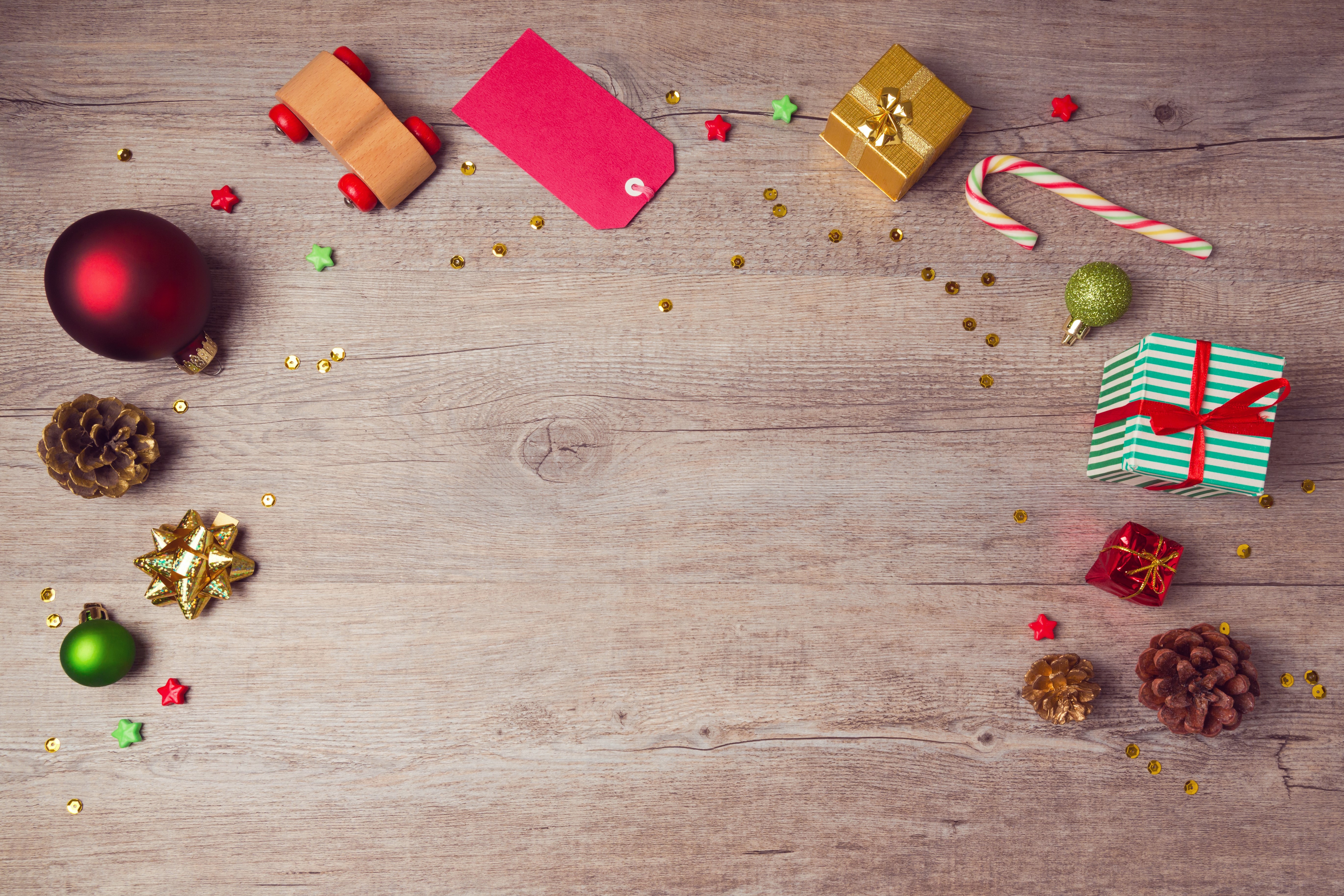 Christmas Gifts and Decorations on Wooden Background HD Wallpaper