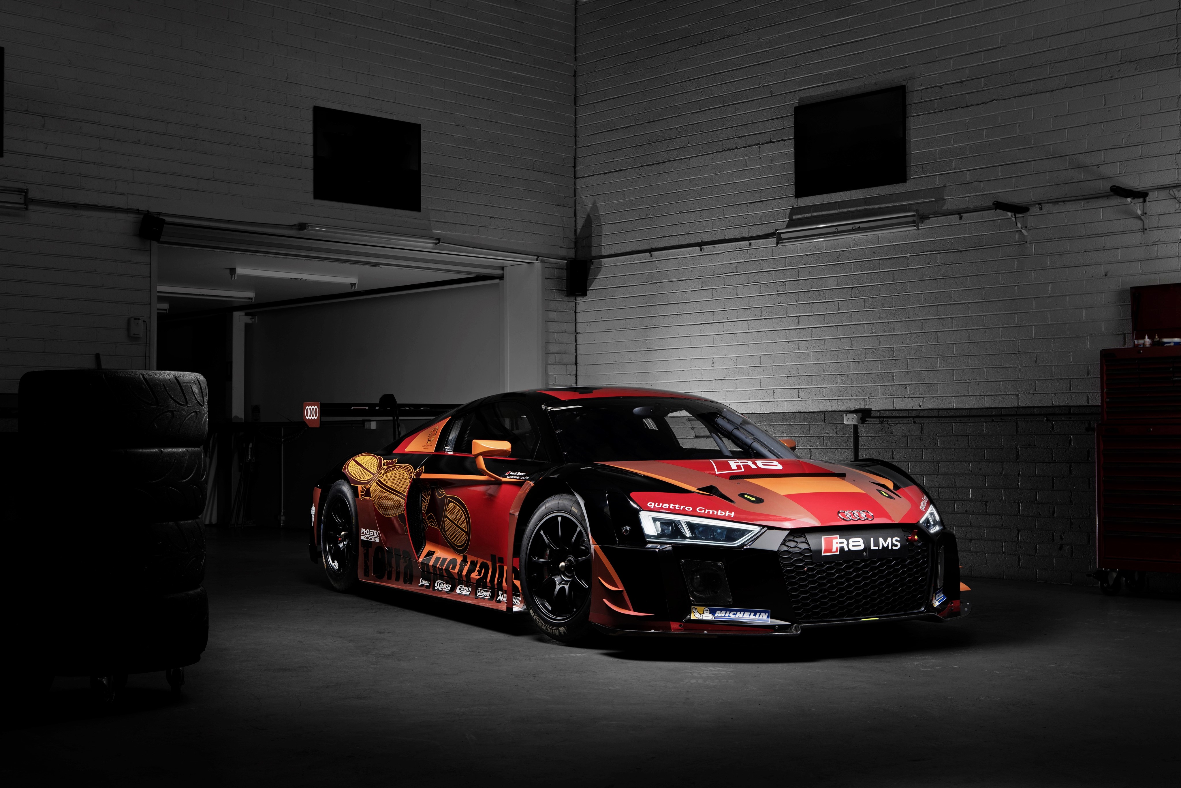 Audi R8 LMS race car in garage HD Wallpaper