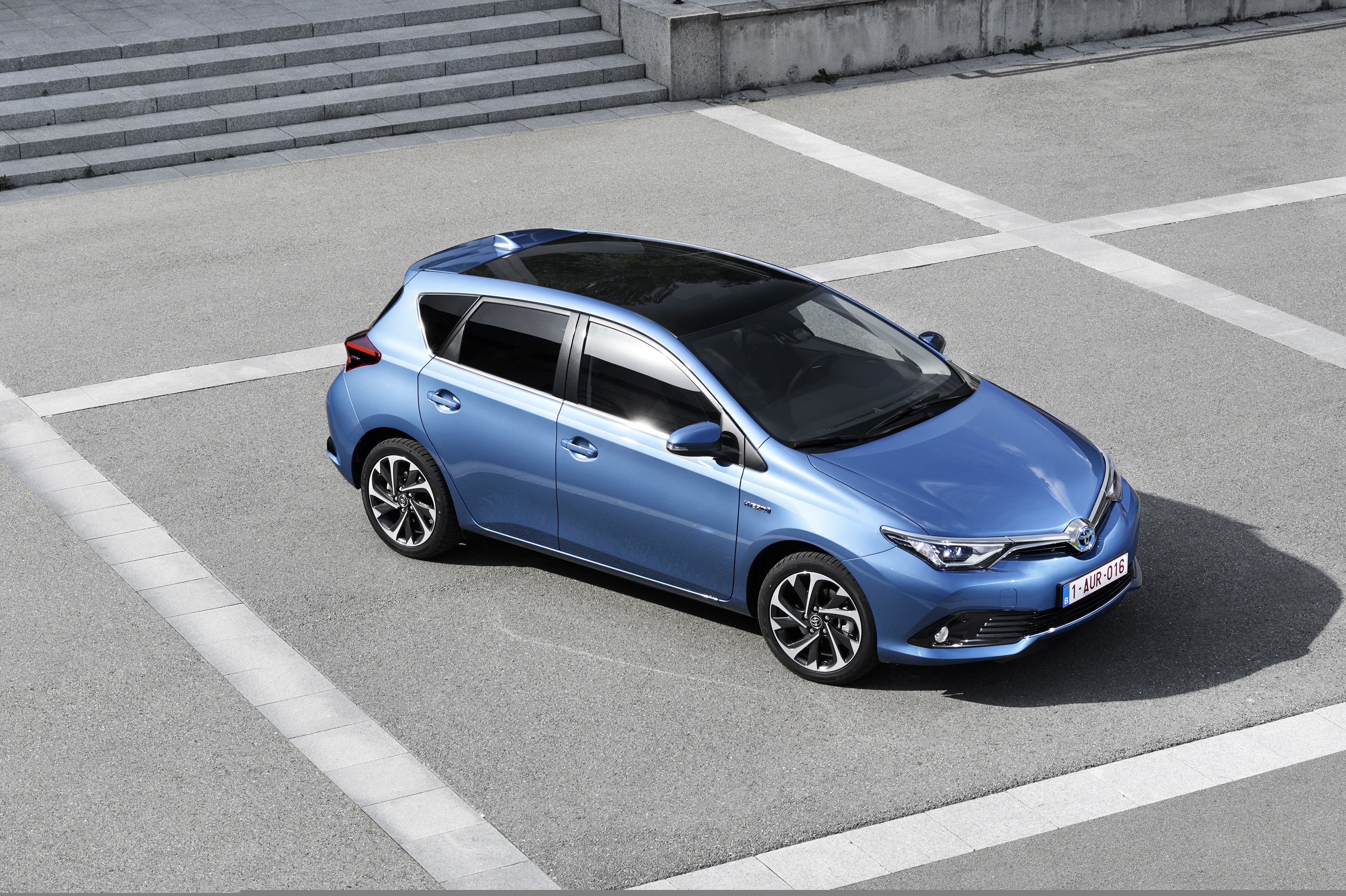 Blue Toyota Auris Hybrid parked on asphalt HD Wallpaper