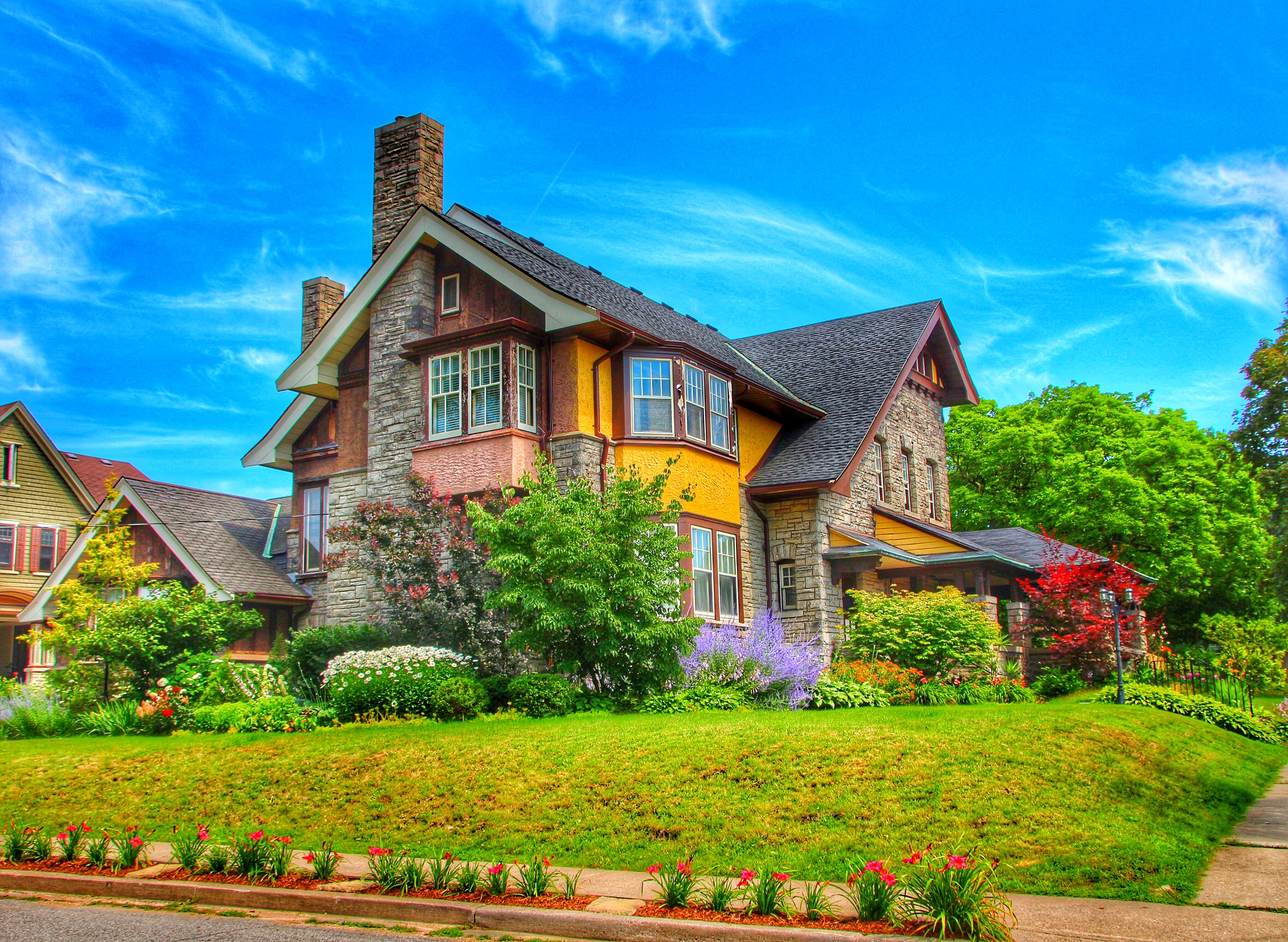 Yellow and stone house with garden in St. Catharines, Ontario HD Wallpaper