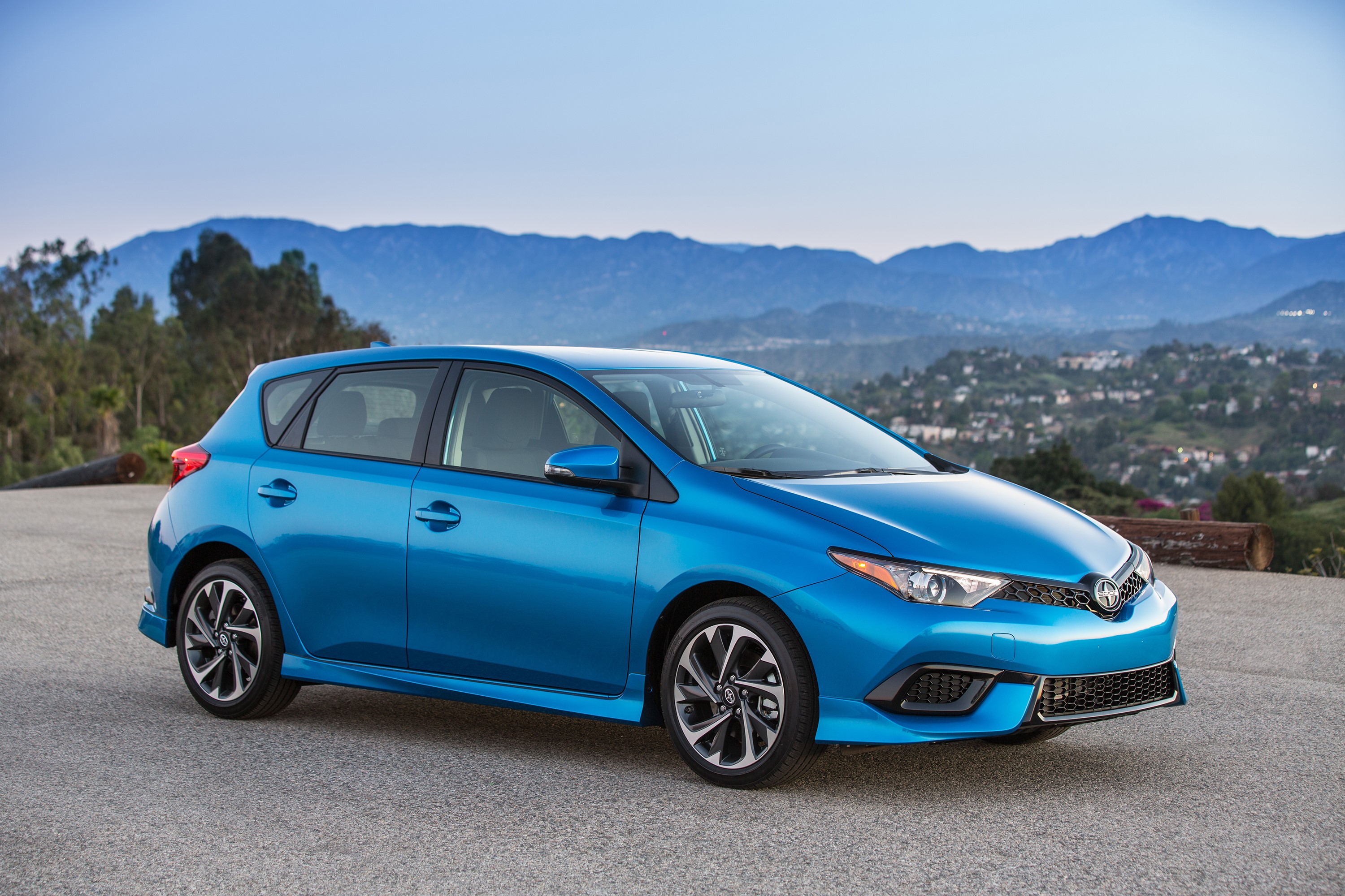 Blue 2015 Scion iM Hatchback HD Wallpaper