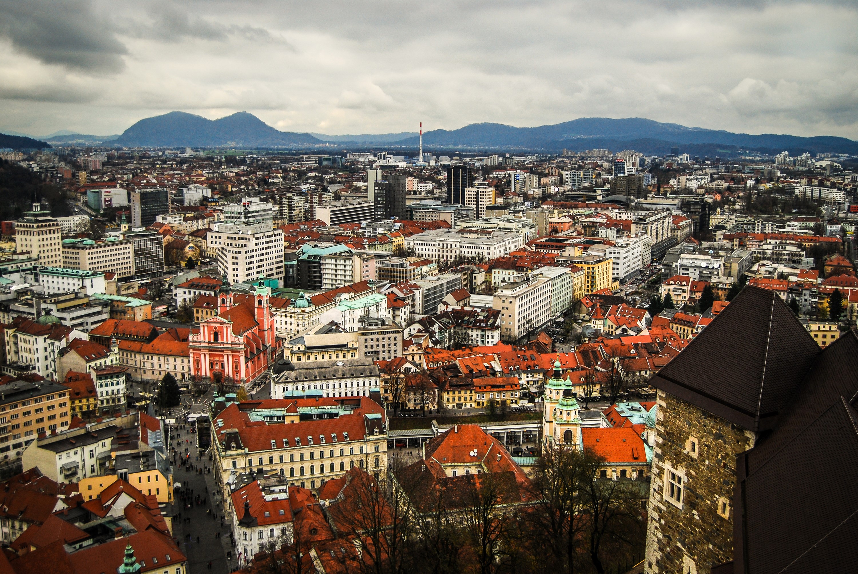 Ljubljana, Slovenia cityscape with mountains HD Wallpaper