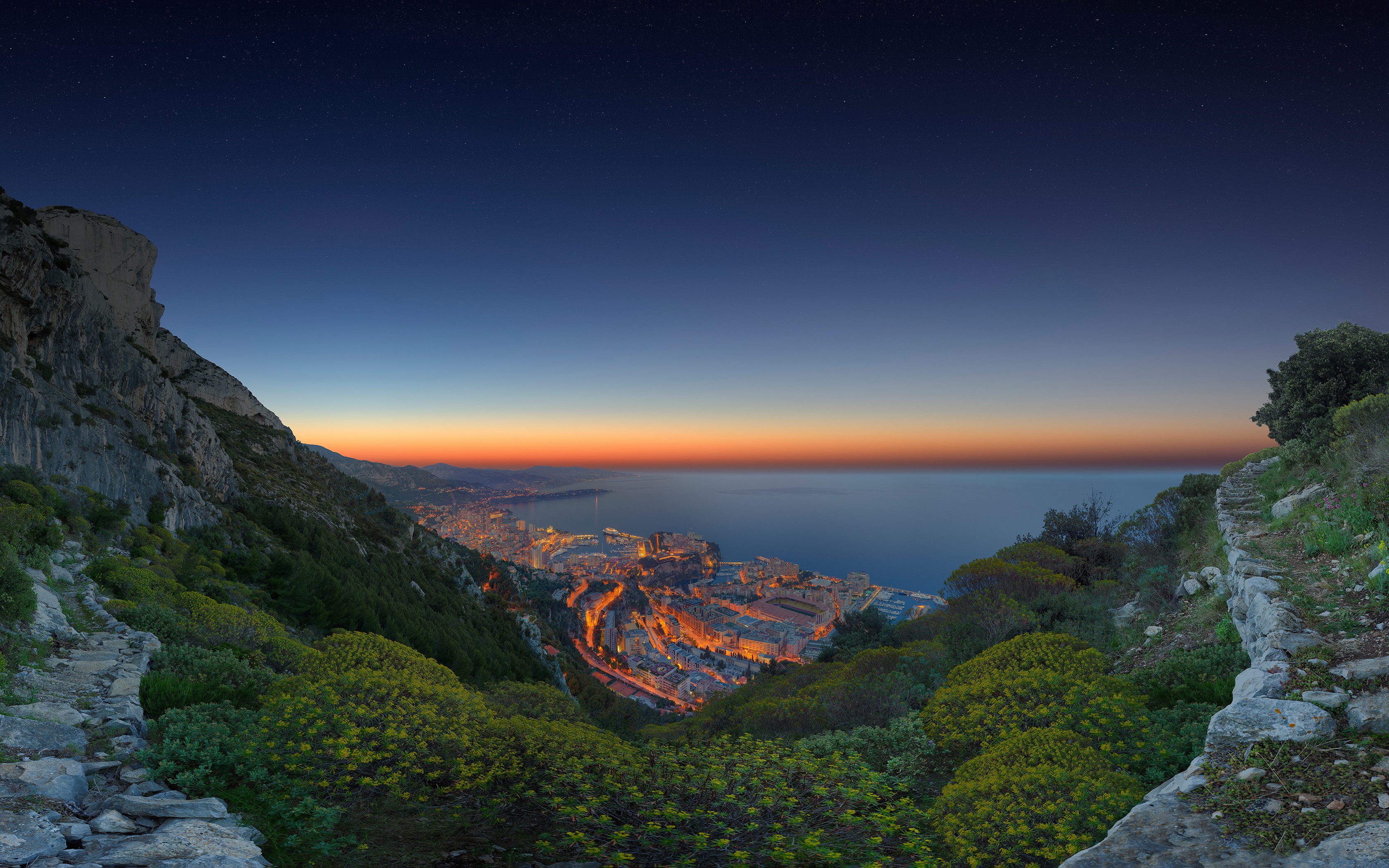 Monaco cityscape at dusk from a mountain viewpoint HD Wallpaper
