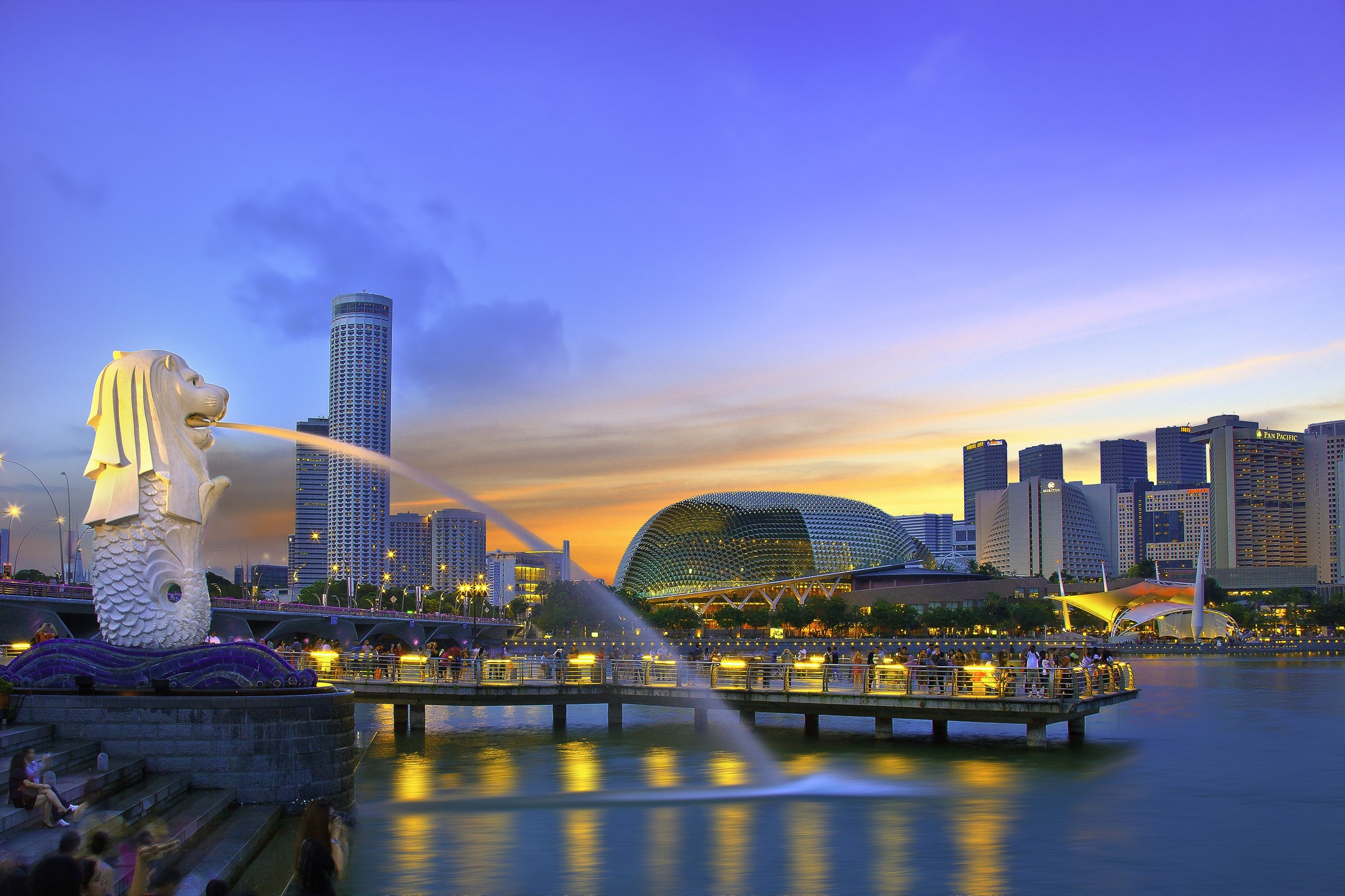 Singapore skyline with Merlion statue at dusk HD Wallpaper