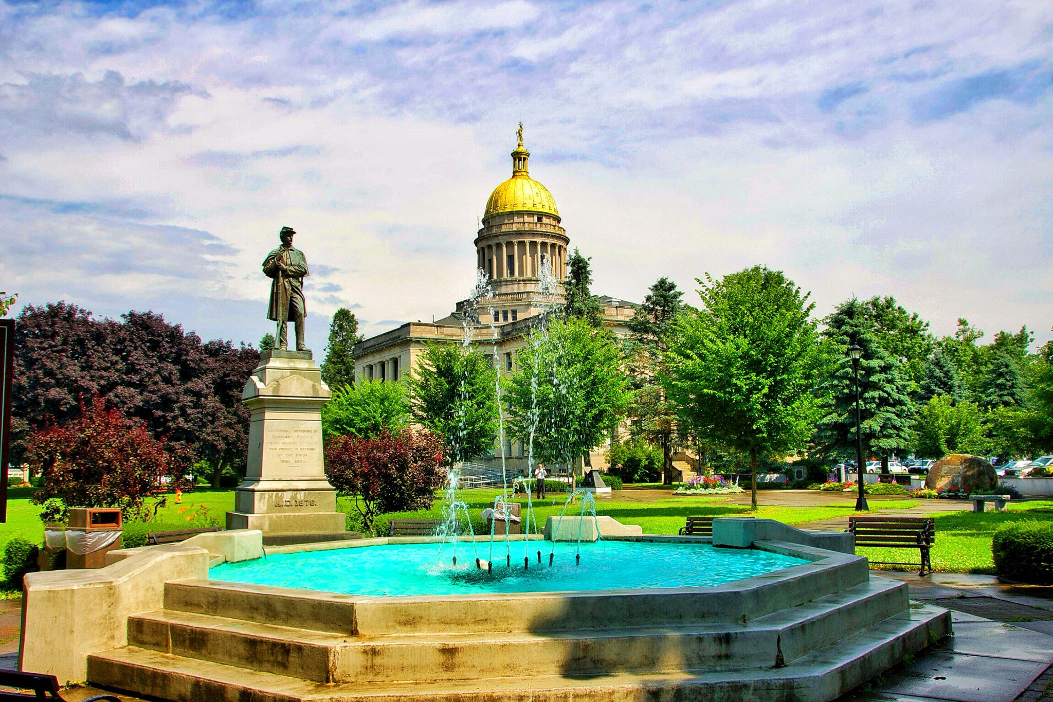Soldier statue and fountain in front of a domed building HD Wallpaper