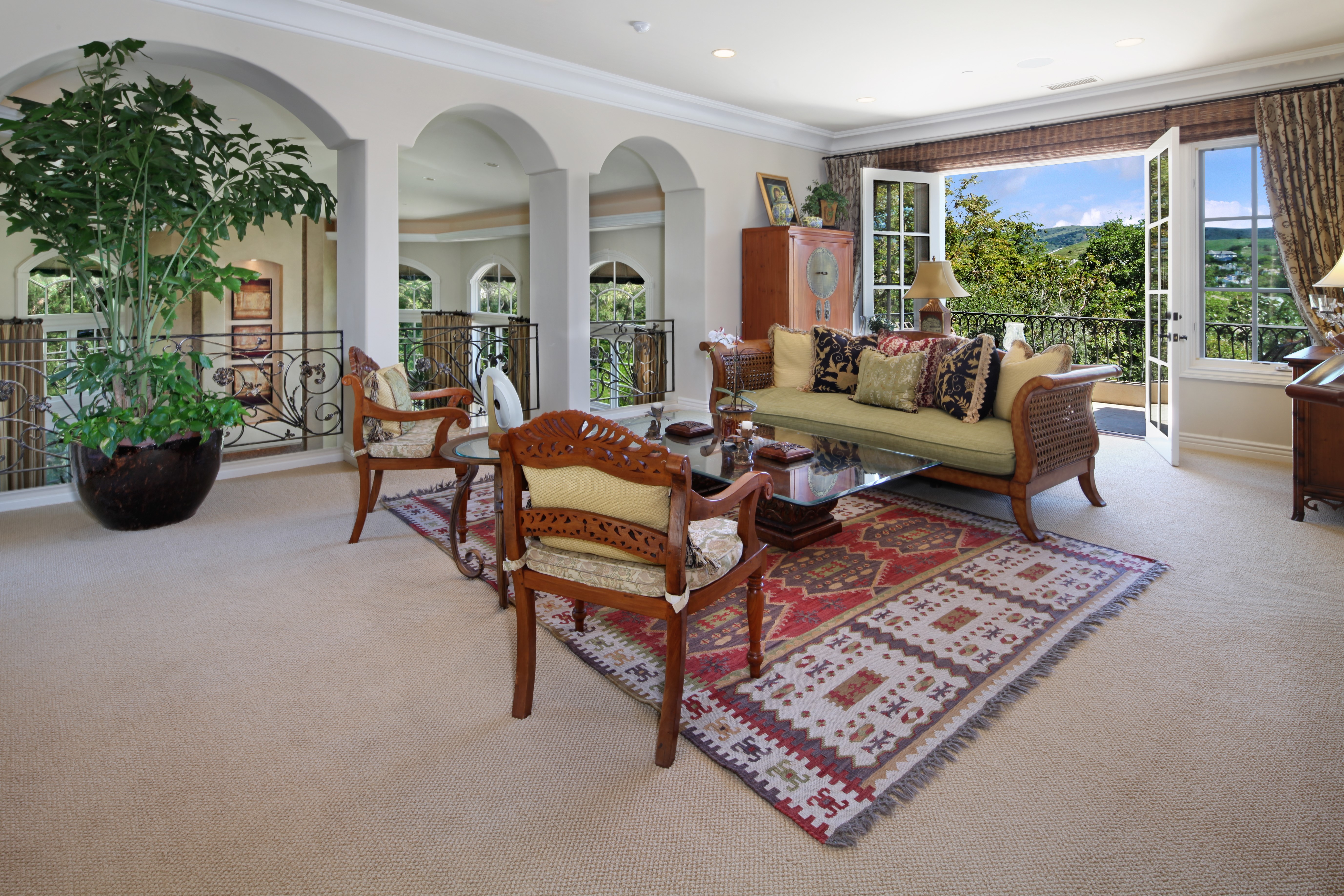 Living room with sofa, carpet, and chairs HD Wallpaper