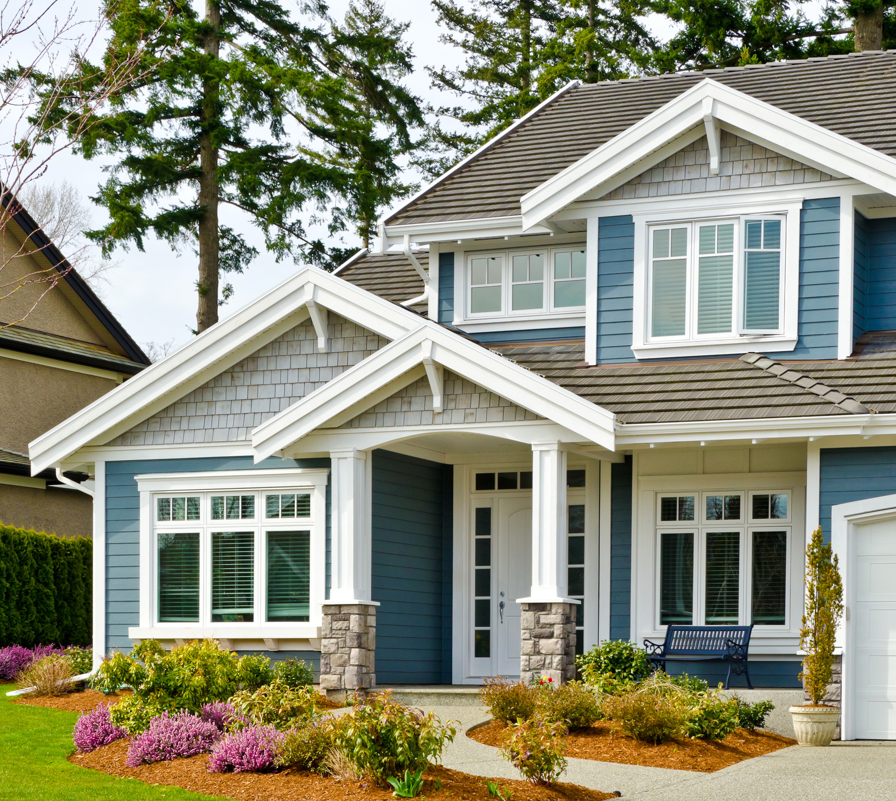 Blue house with white trim and landscaping HD Wallpaper