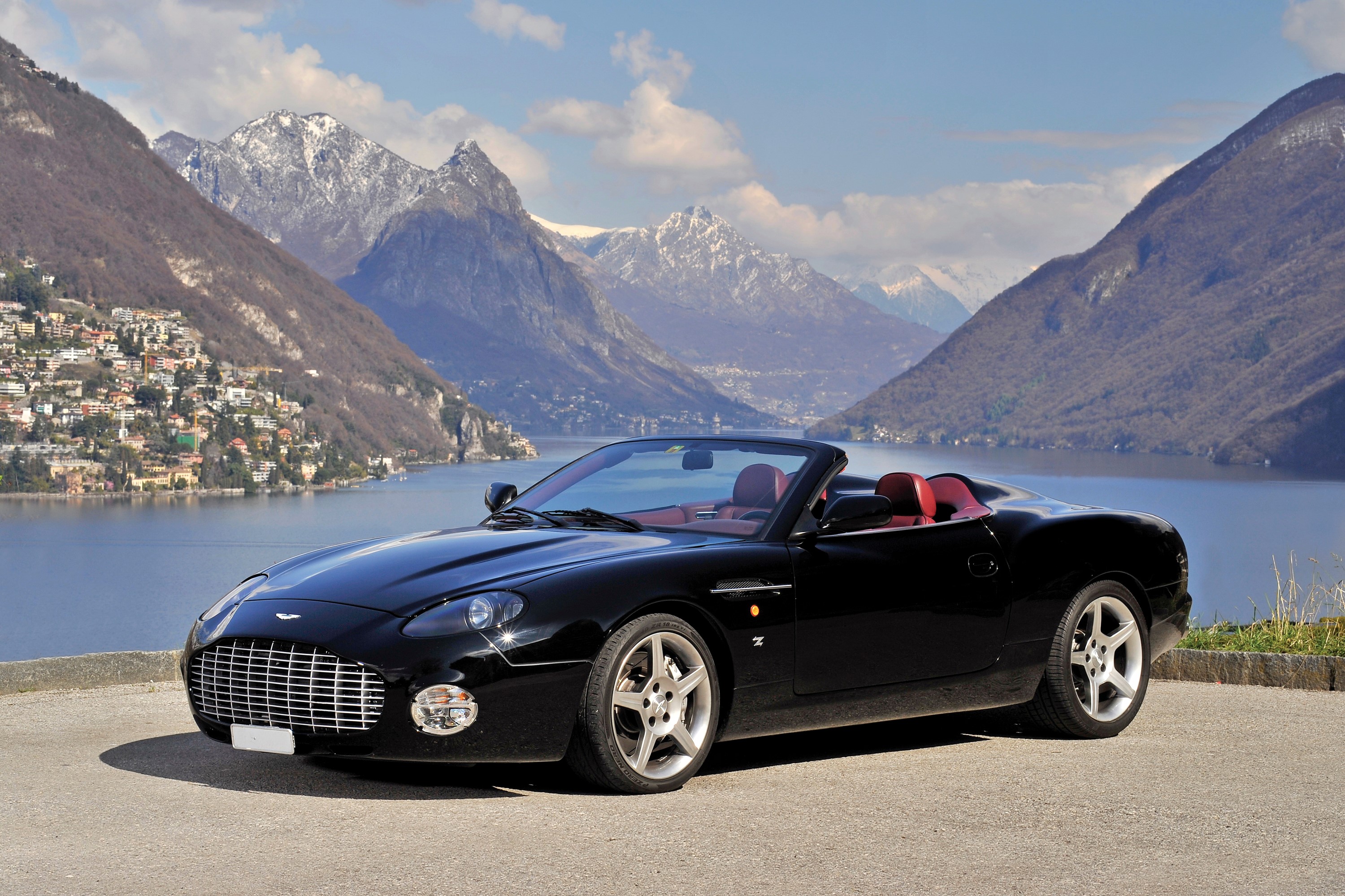 Black Aston Martin Convertible with Red Interior HD Wallpaper