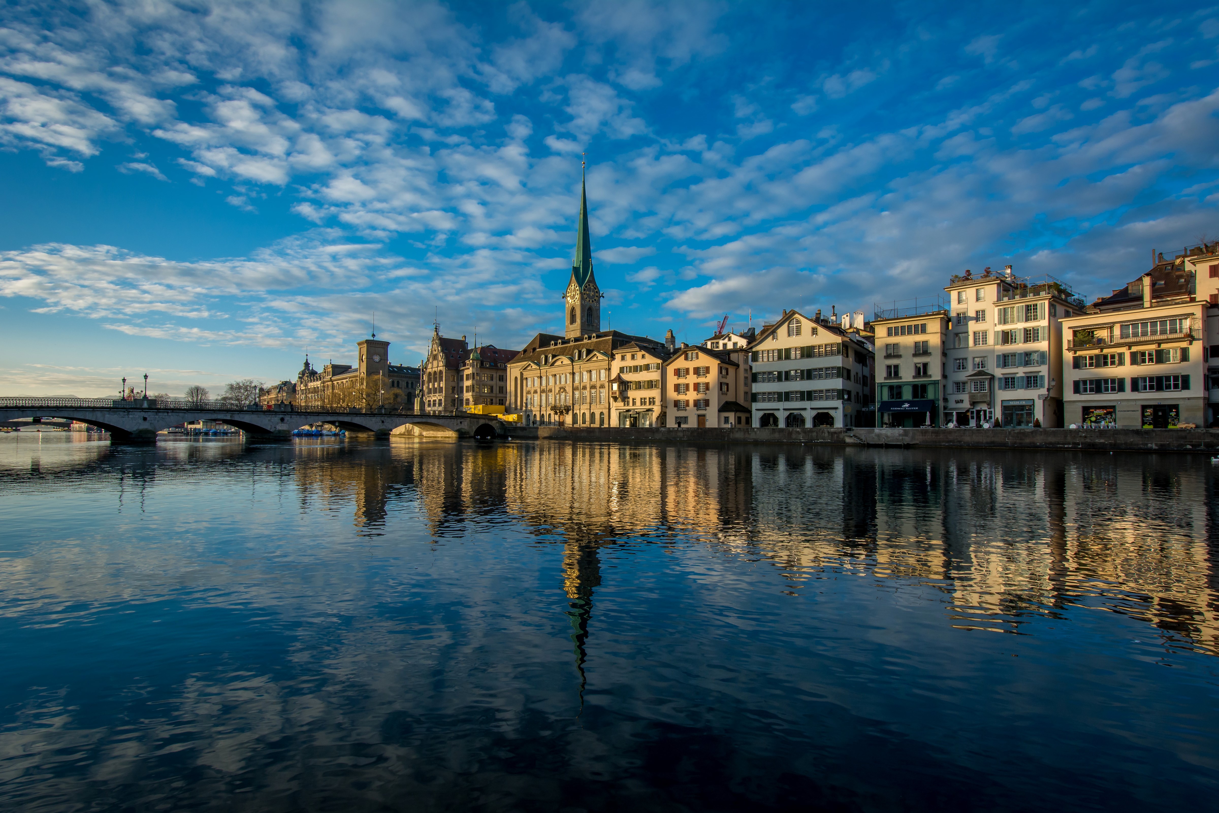 Zurich cityscape with river and bridge HD Wallpaper