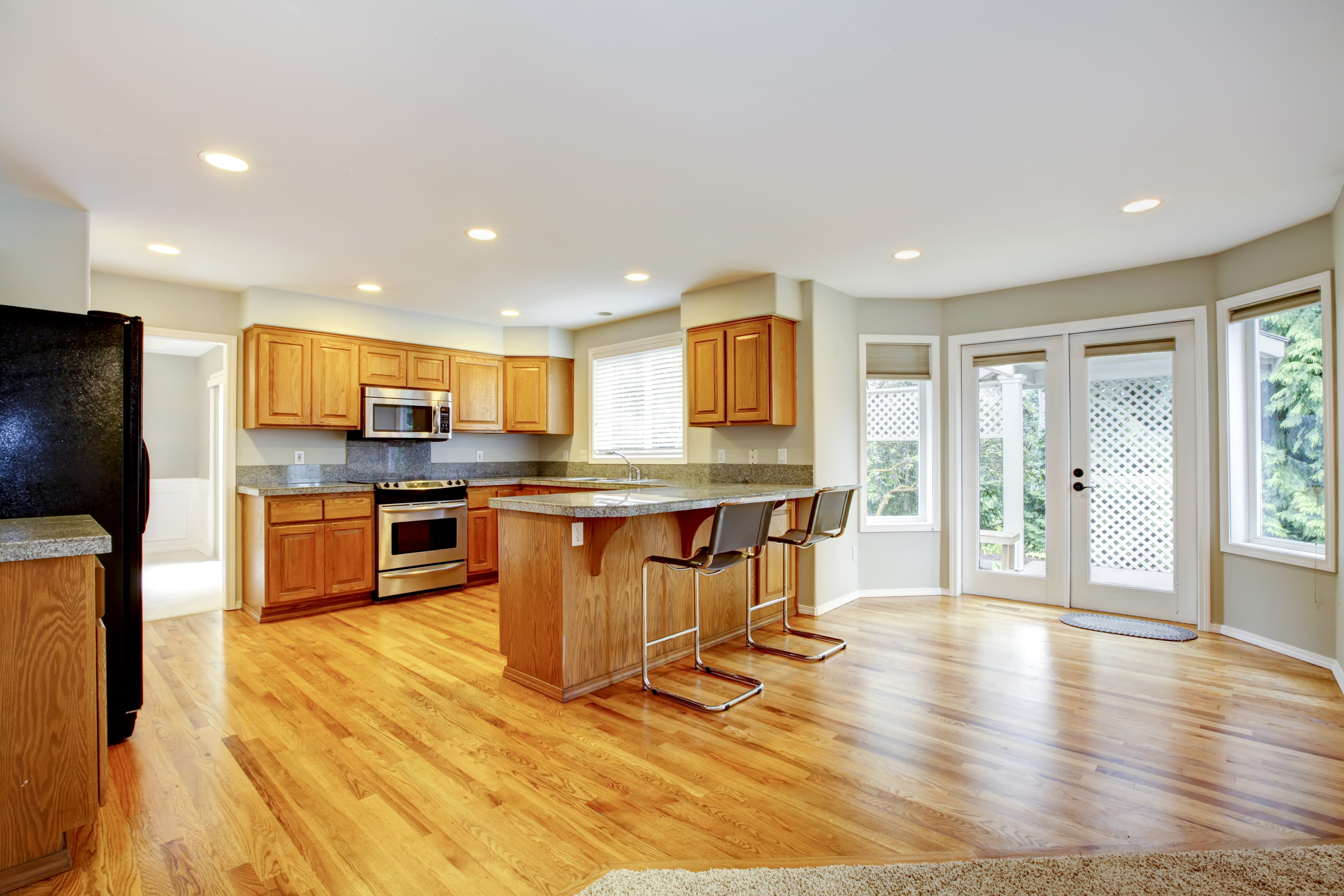 Kitchen with island and dining area HD Wallpaper