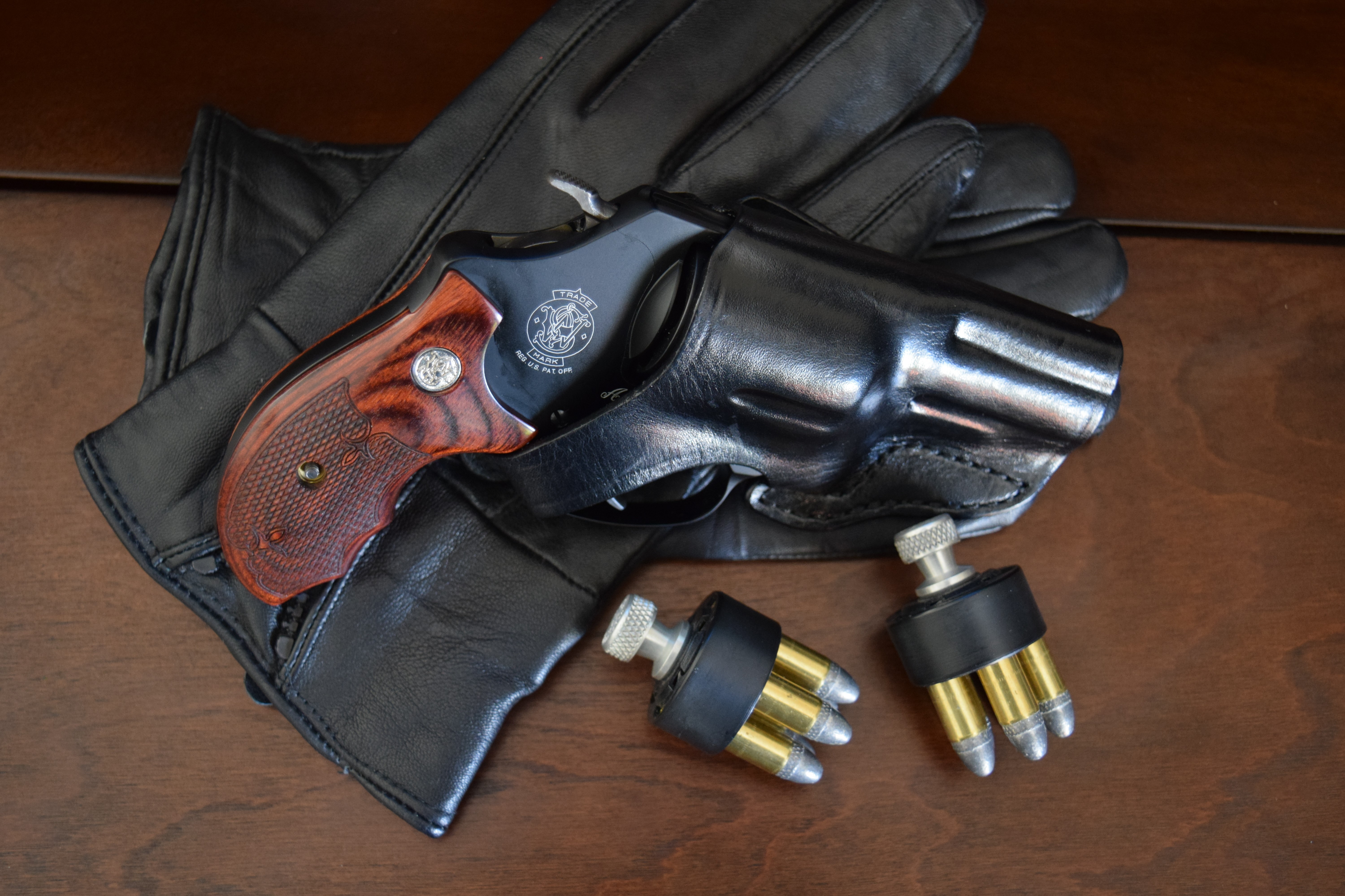 Smith & Wesson Revolver with Ammunition and Gloves HD Wallpaper