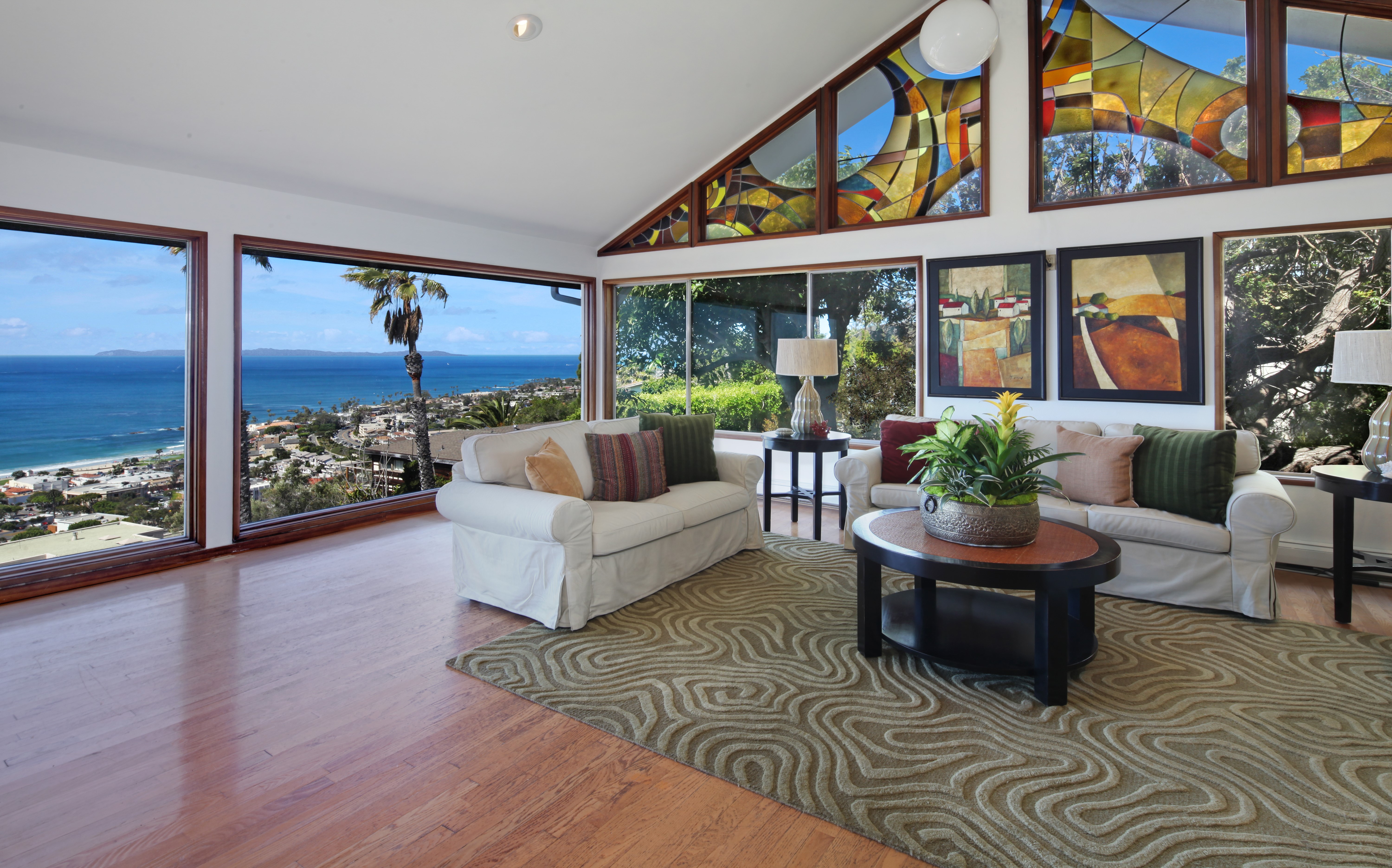 Living room with ocean view and stained glass HD Wallpaper