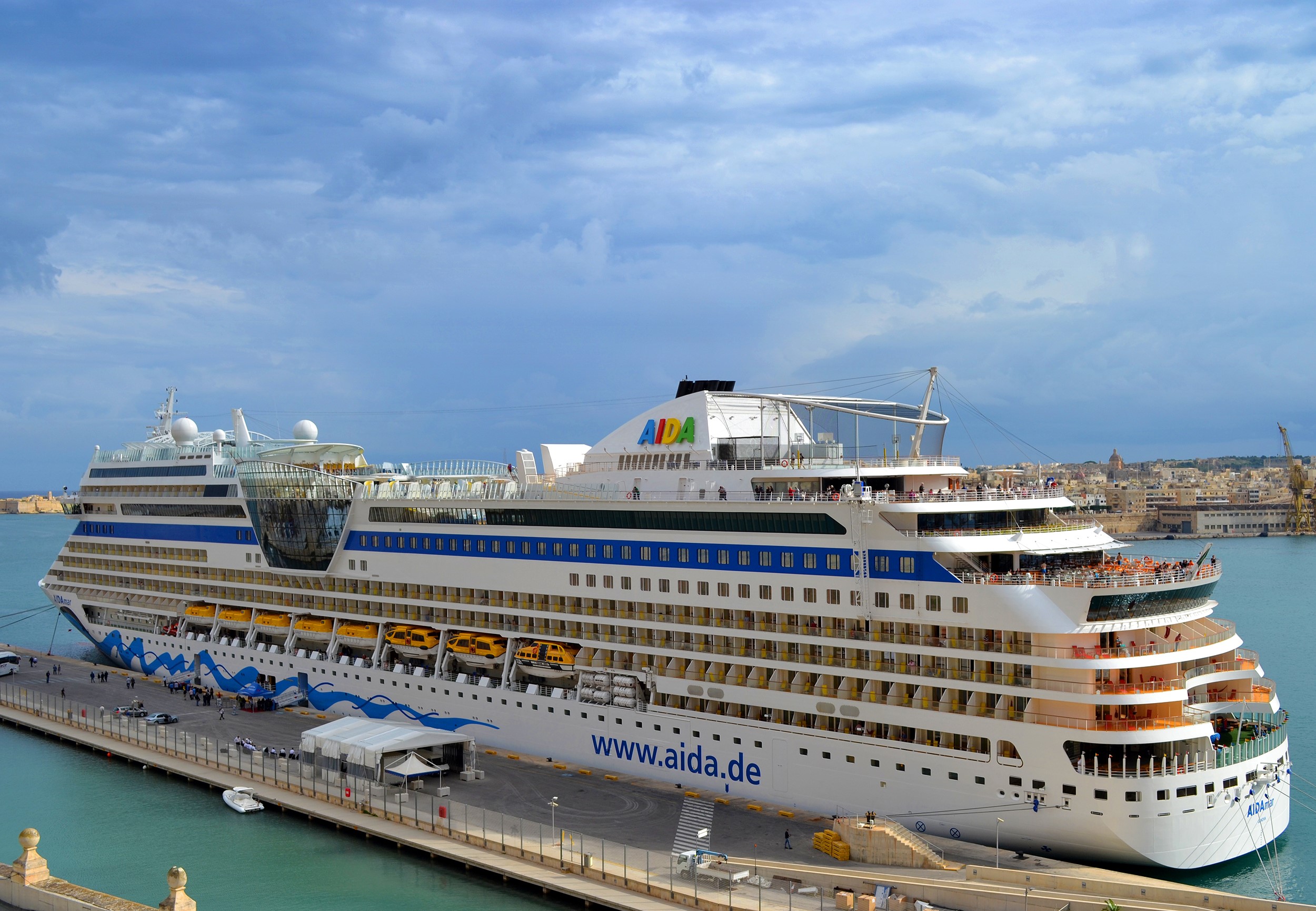 AIDA Cruise Ship docked at a harbor HD Wallpaper
