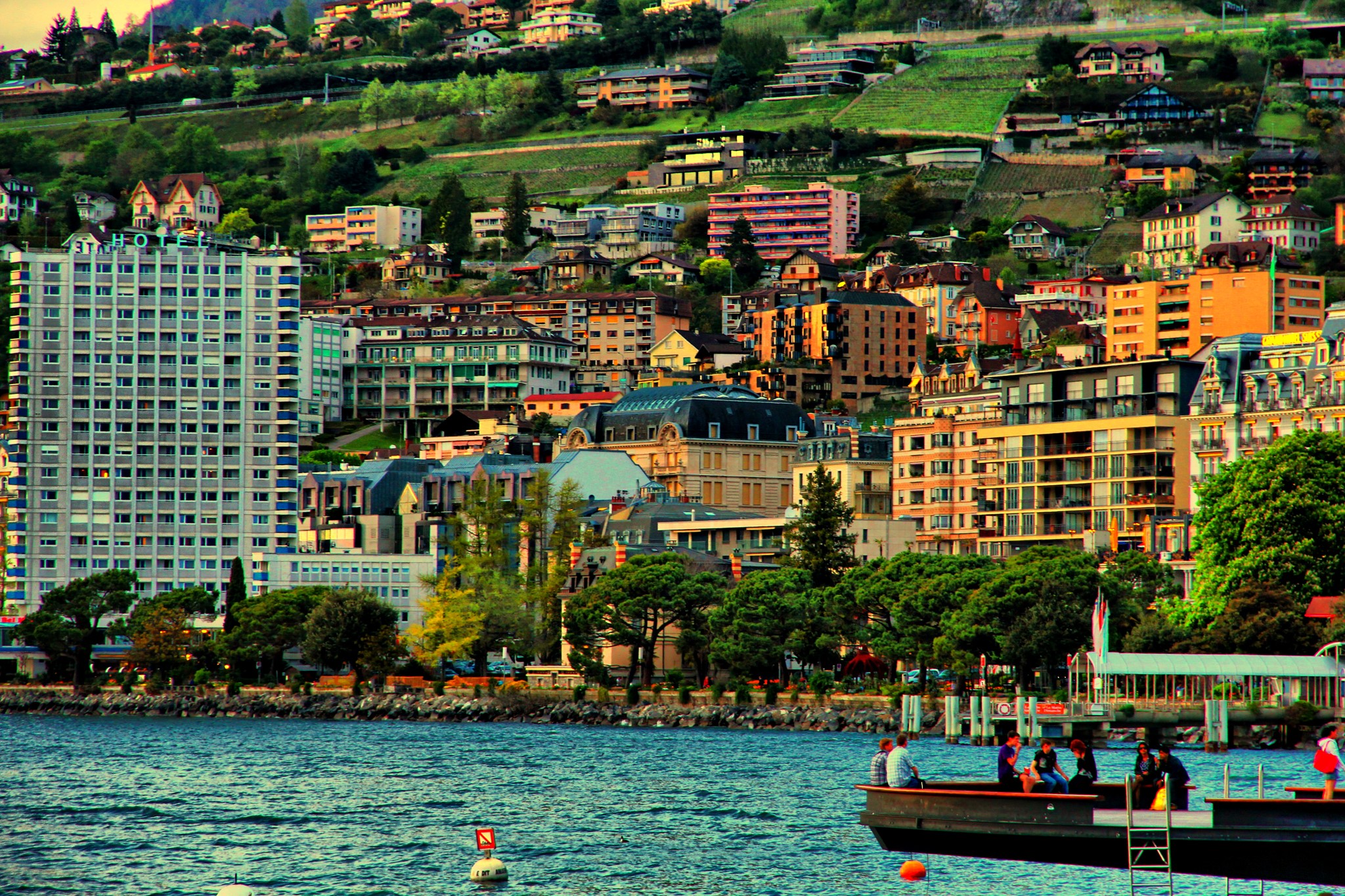 Montreux, Switzerland cityscape on a hillside overlooking a lake HD Wallpaper