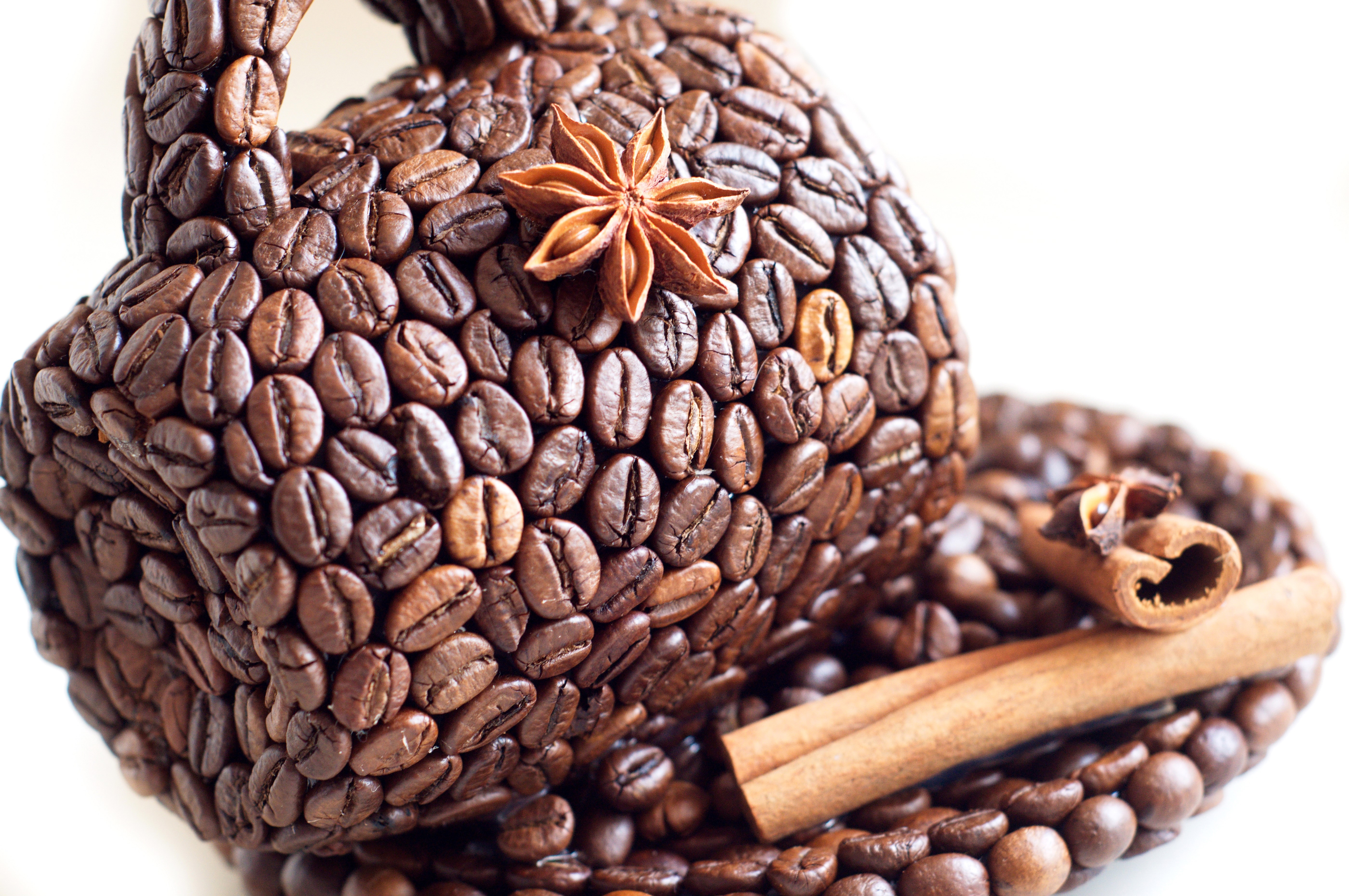 Coffee cup and saucer made of coffee beans with cinnamon and star anise HD Wallpaper