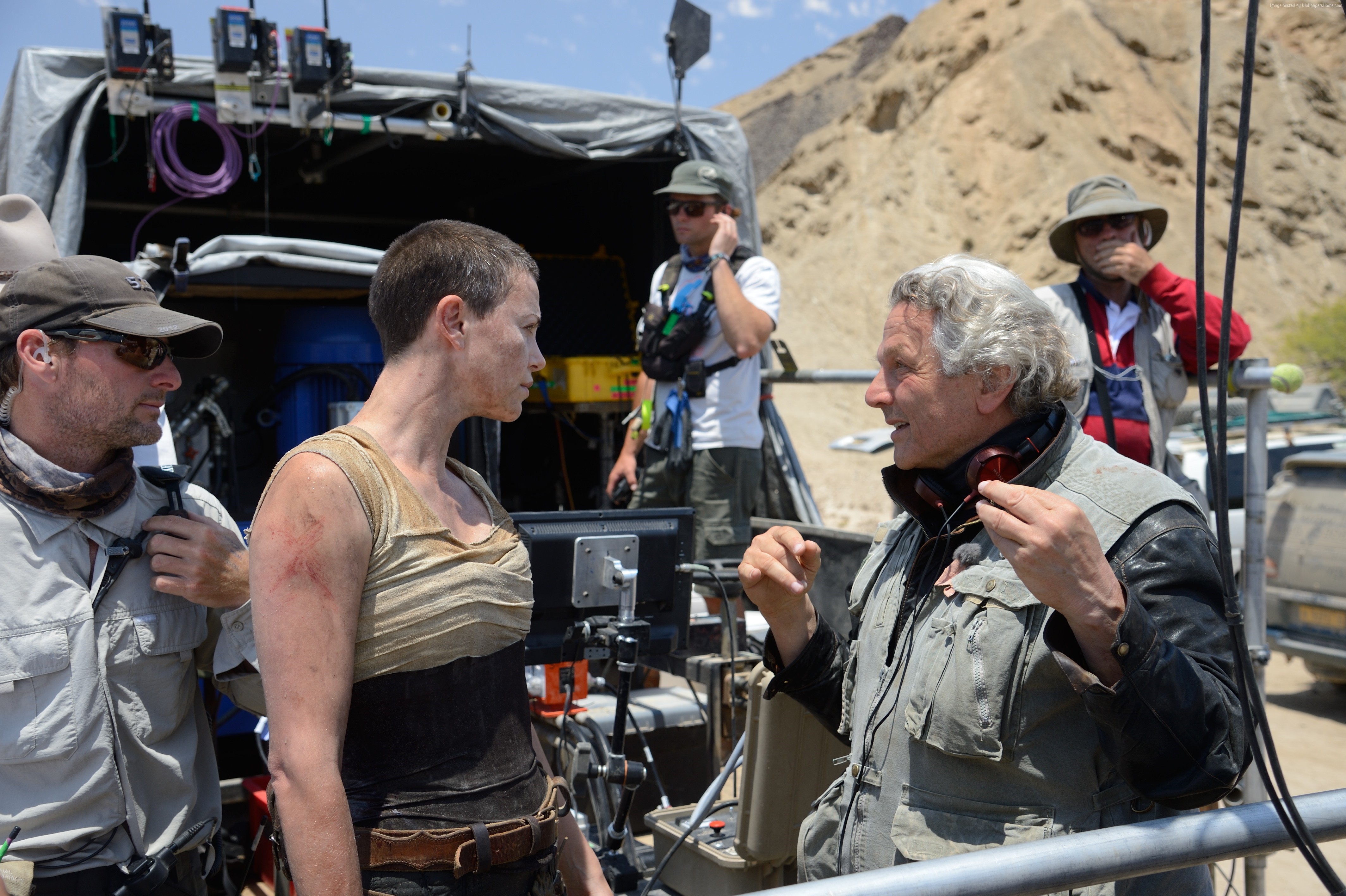 Charlize Theron and George Miller on Mad Max: Fury Road set HD Wallpaper