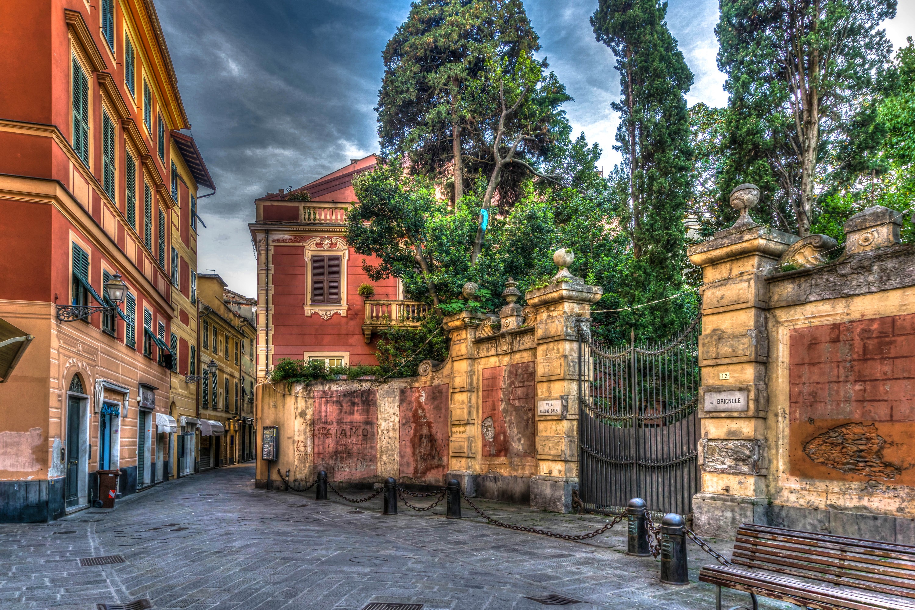 Street in Sestri Levante, Italy with old buildings and gate HD Wallpaper