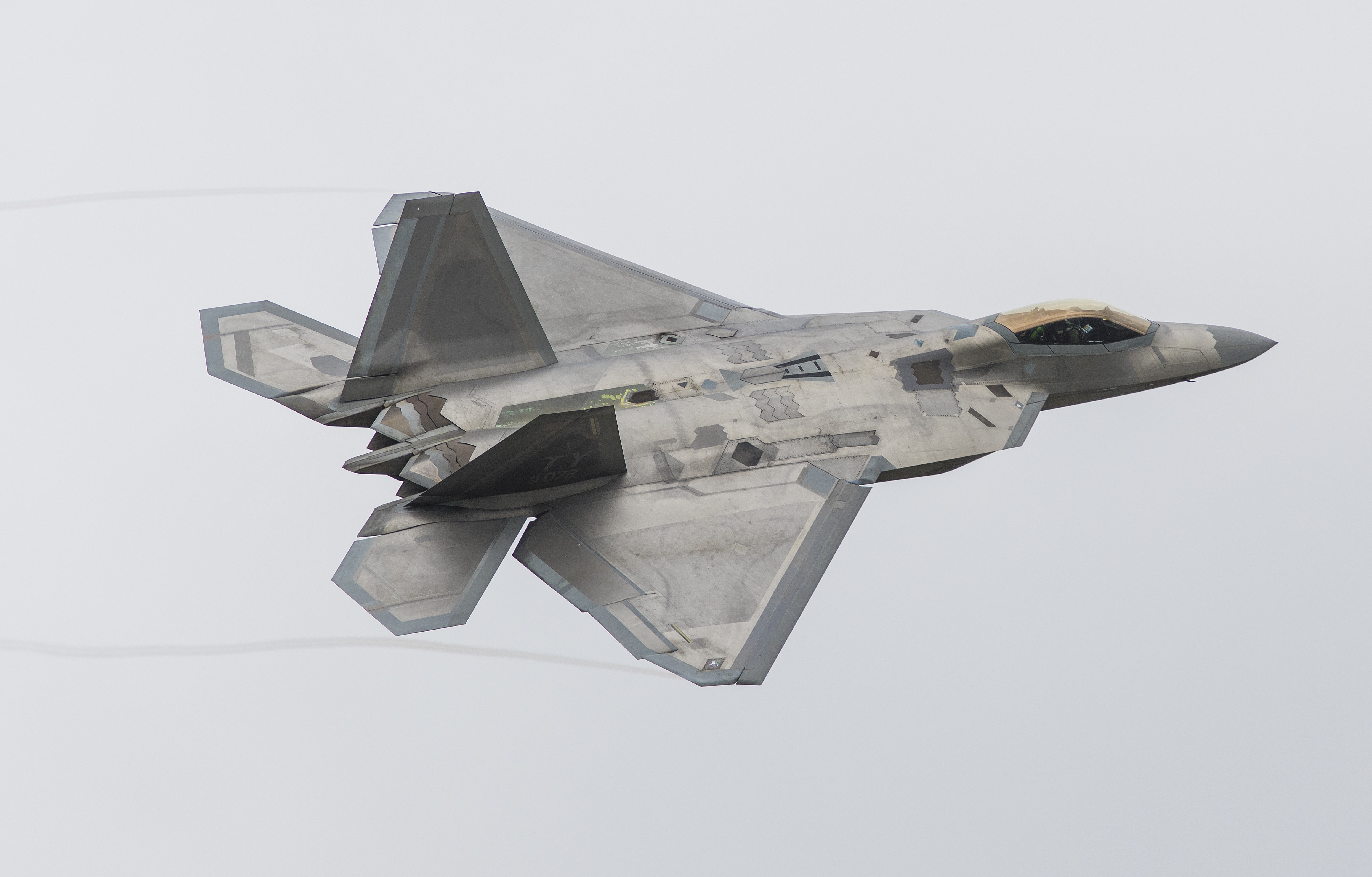 Lockheed F-22A Raptor fighter jet in flight HD Wallpaper