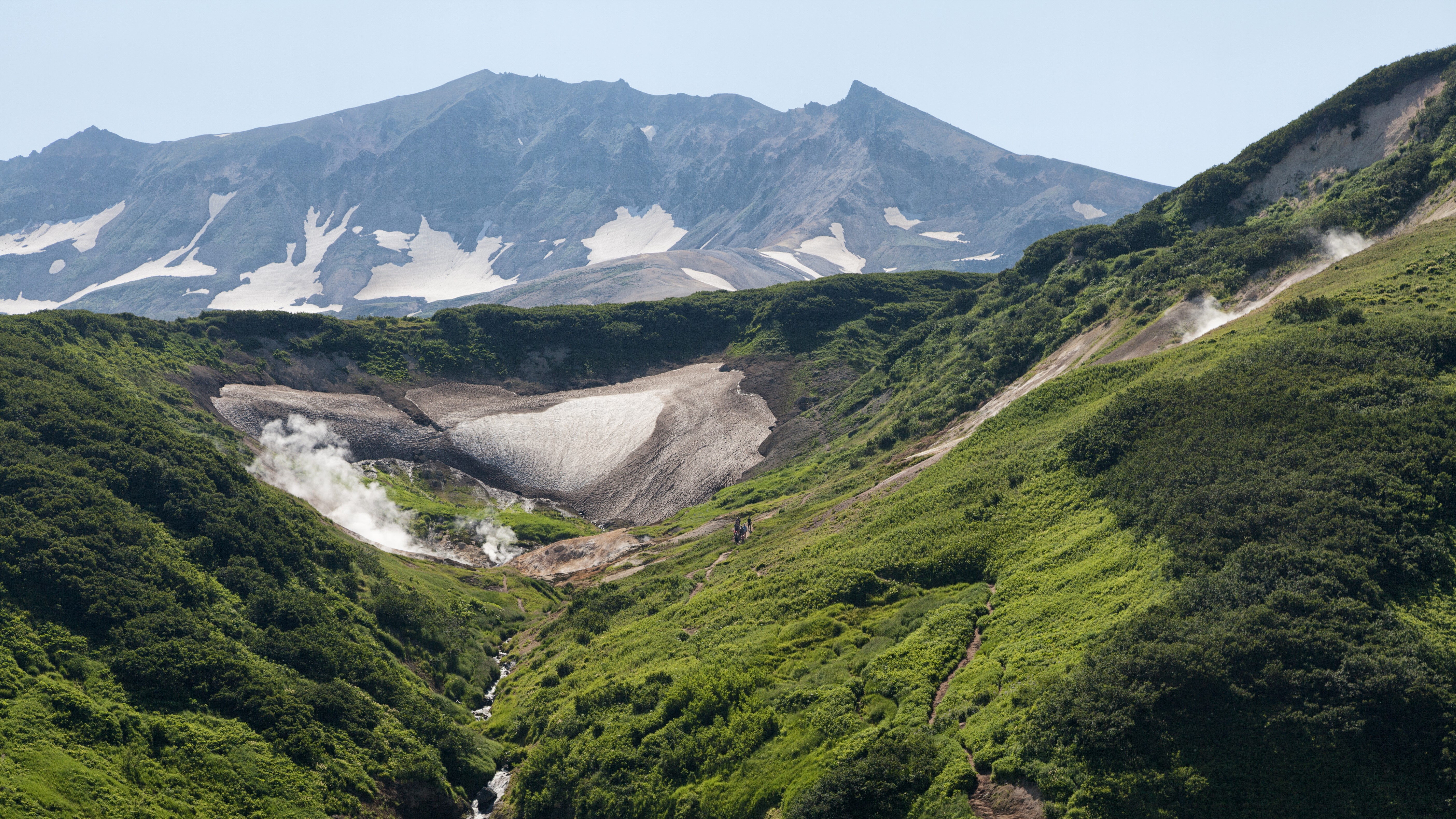 Steam vents in a valley on Kamchatka Peninsula, Russia HD Wallpaper