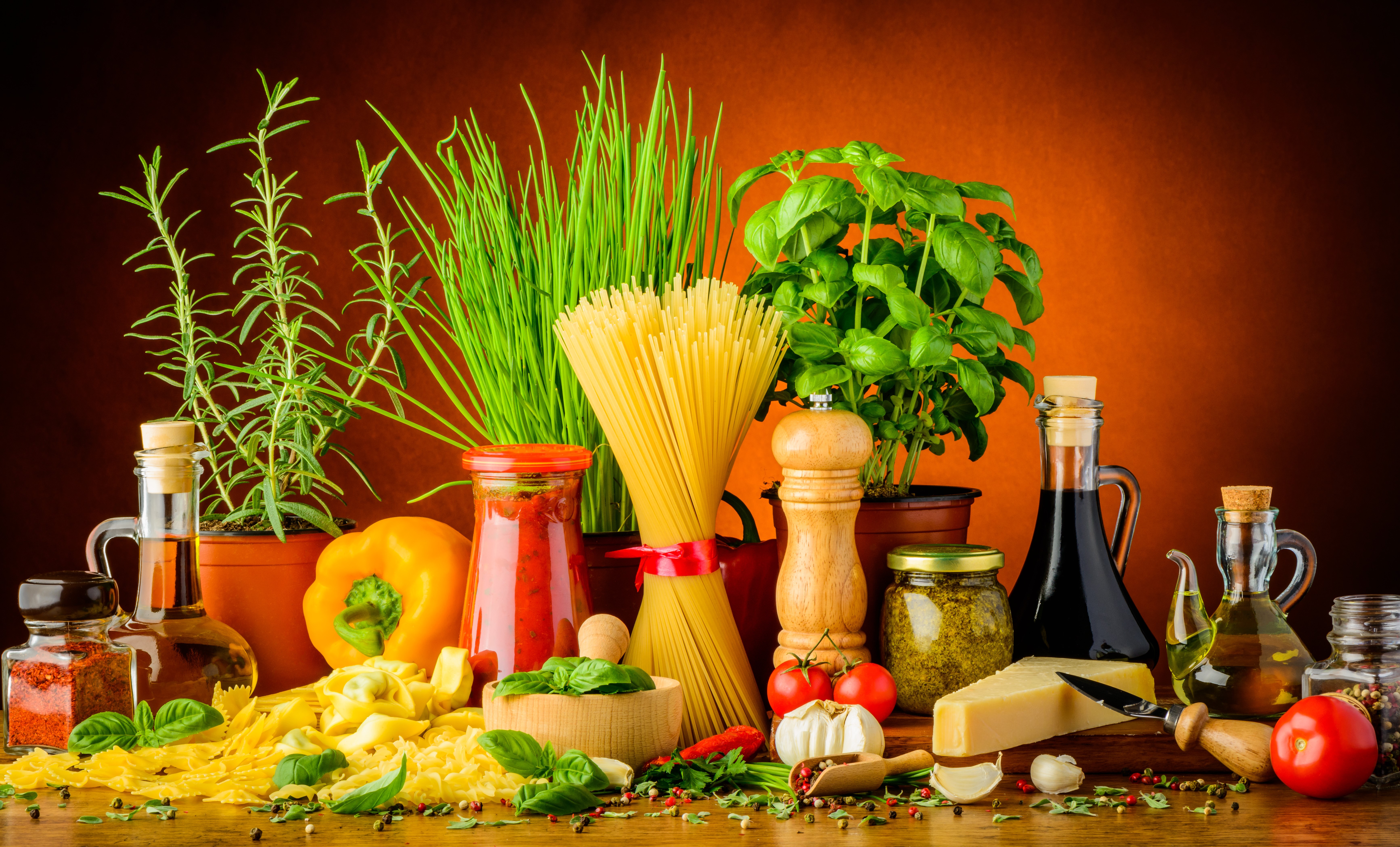 Still-life of Italian ingredients with pasta and spices HD Wallpaper