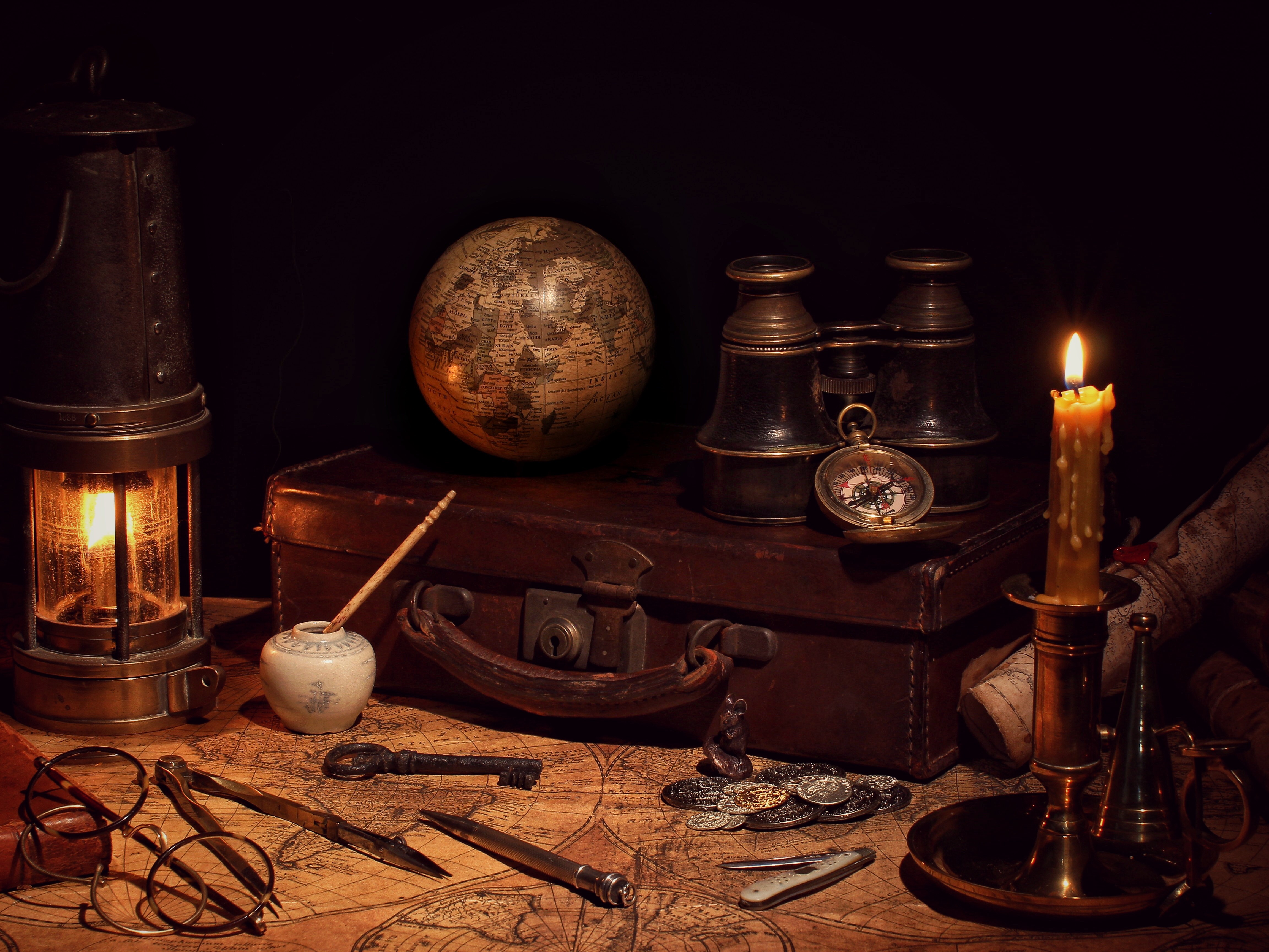 Still-life with vintage travel items and maps HD Wallpaper
