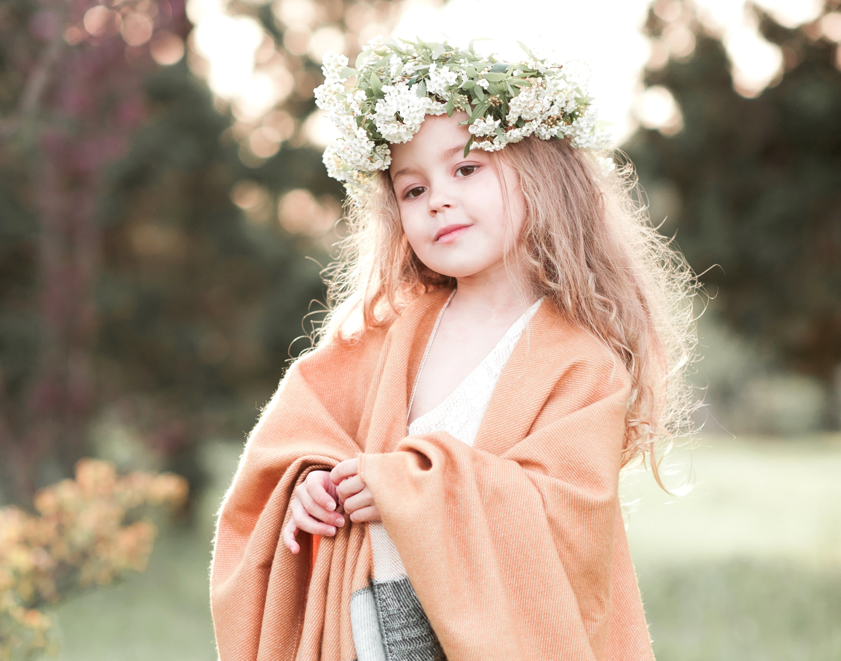 Young girl with flower crown and orange shawl HD Wallpaper