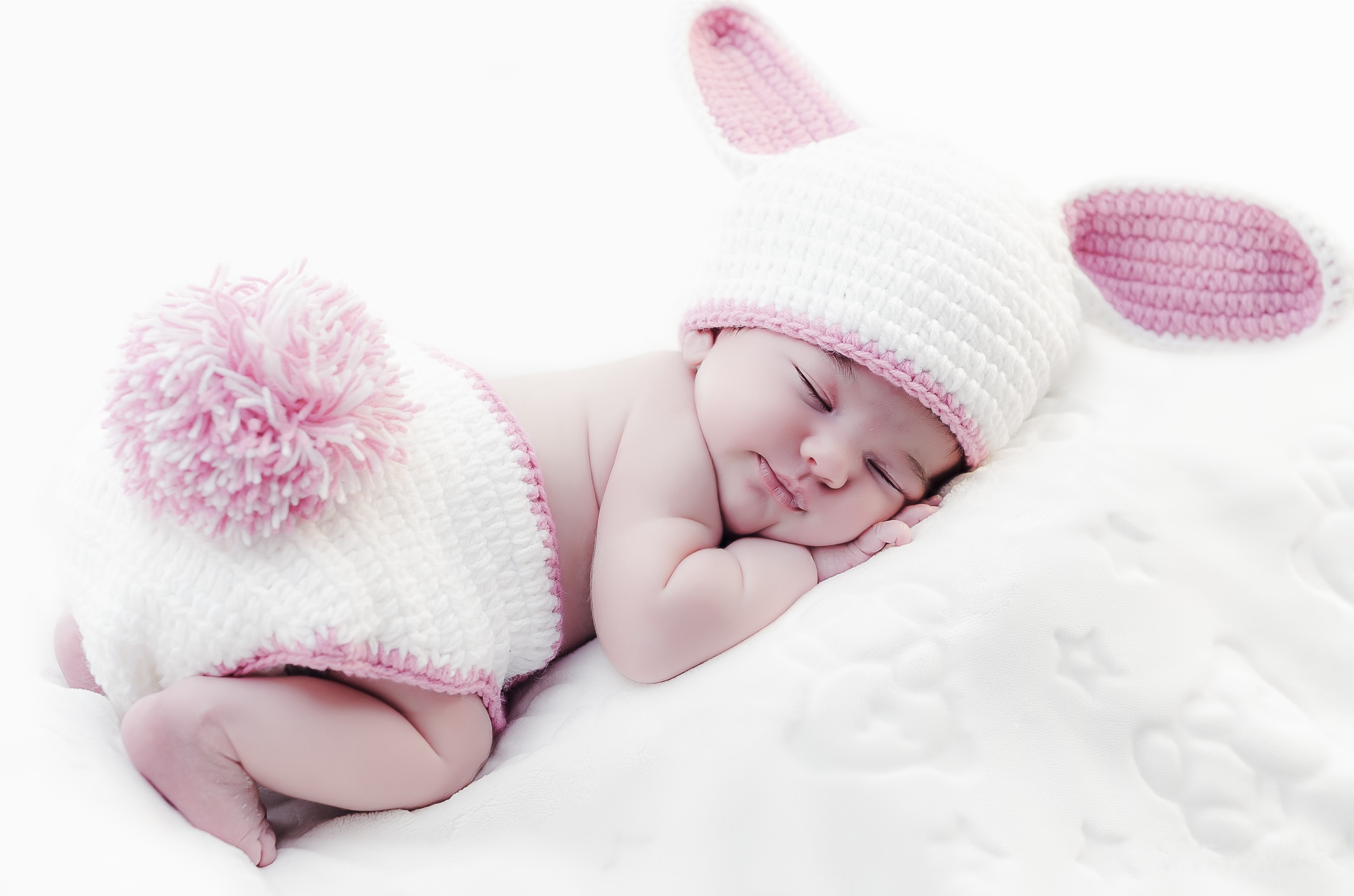 Baby in a bunny costume sleeping HD Wallpaper