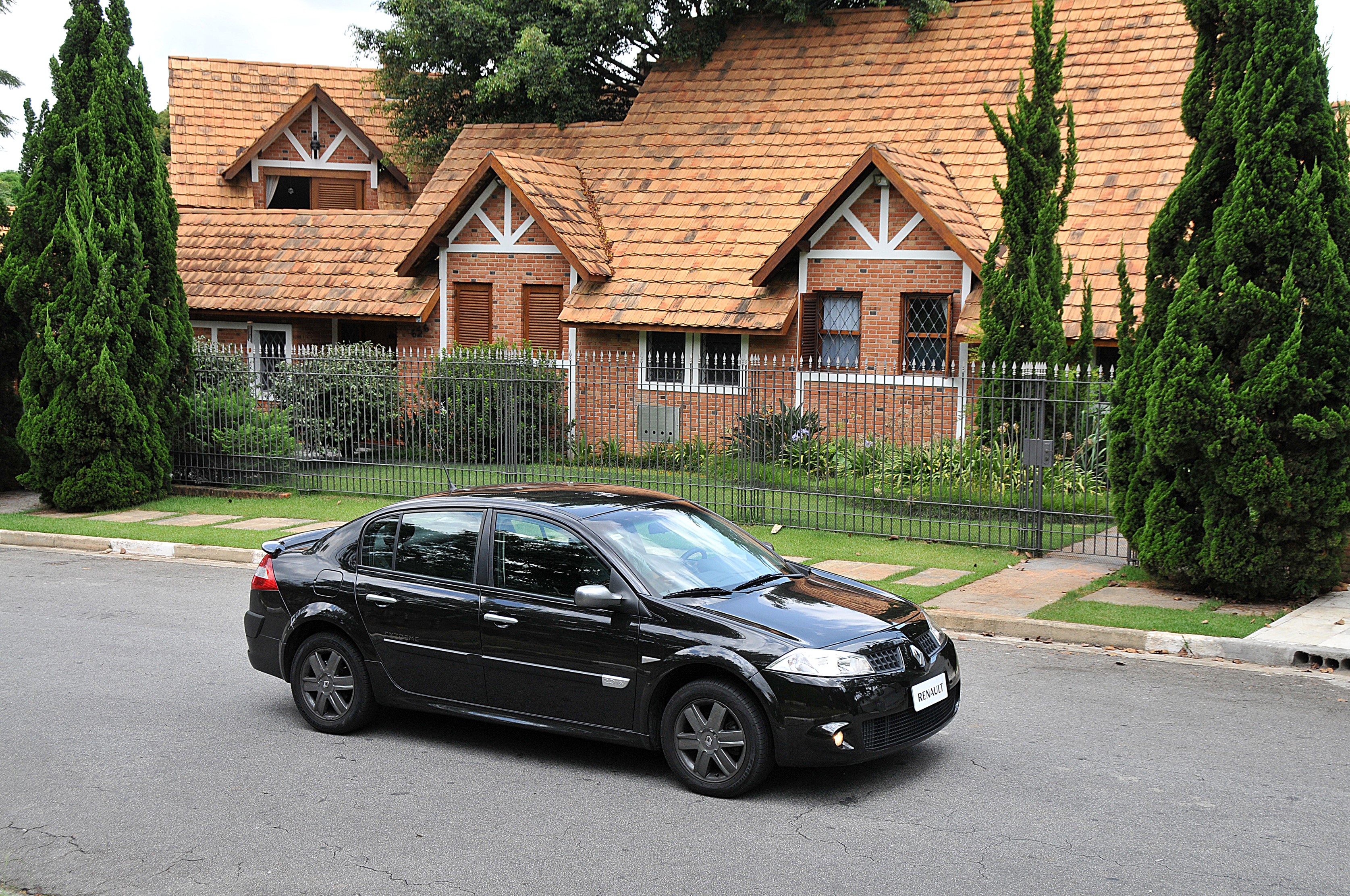 Black Renault Megane Extreme sedan on a street HD Wallpaper
